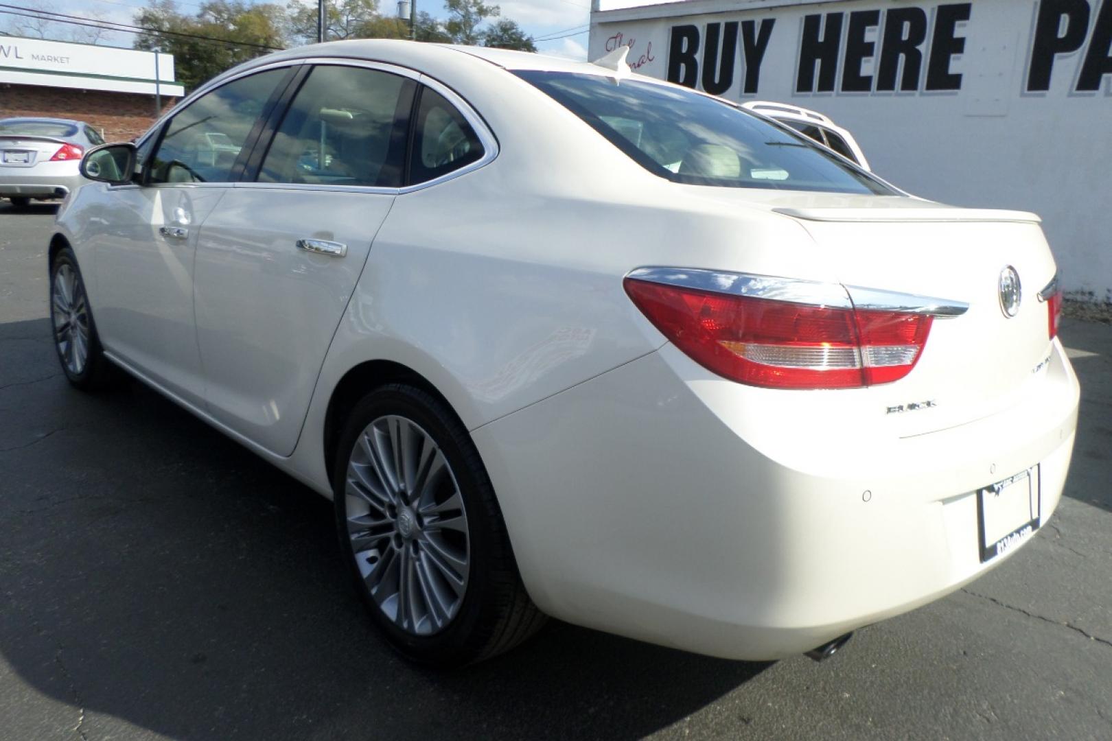 2012 White /Tan Buick Verano Leather (1G4PS5SK5C4) with an 2.4L L4 DOHC 16V FFV engine, 6-Speed Automatic transmission, located at 6112 N Florida Avenue, Tampa, FL, 33604, (888) 521-5131, 27.954929, -82.459534 - Photo#4