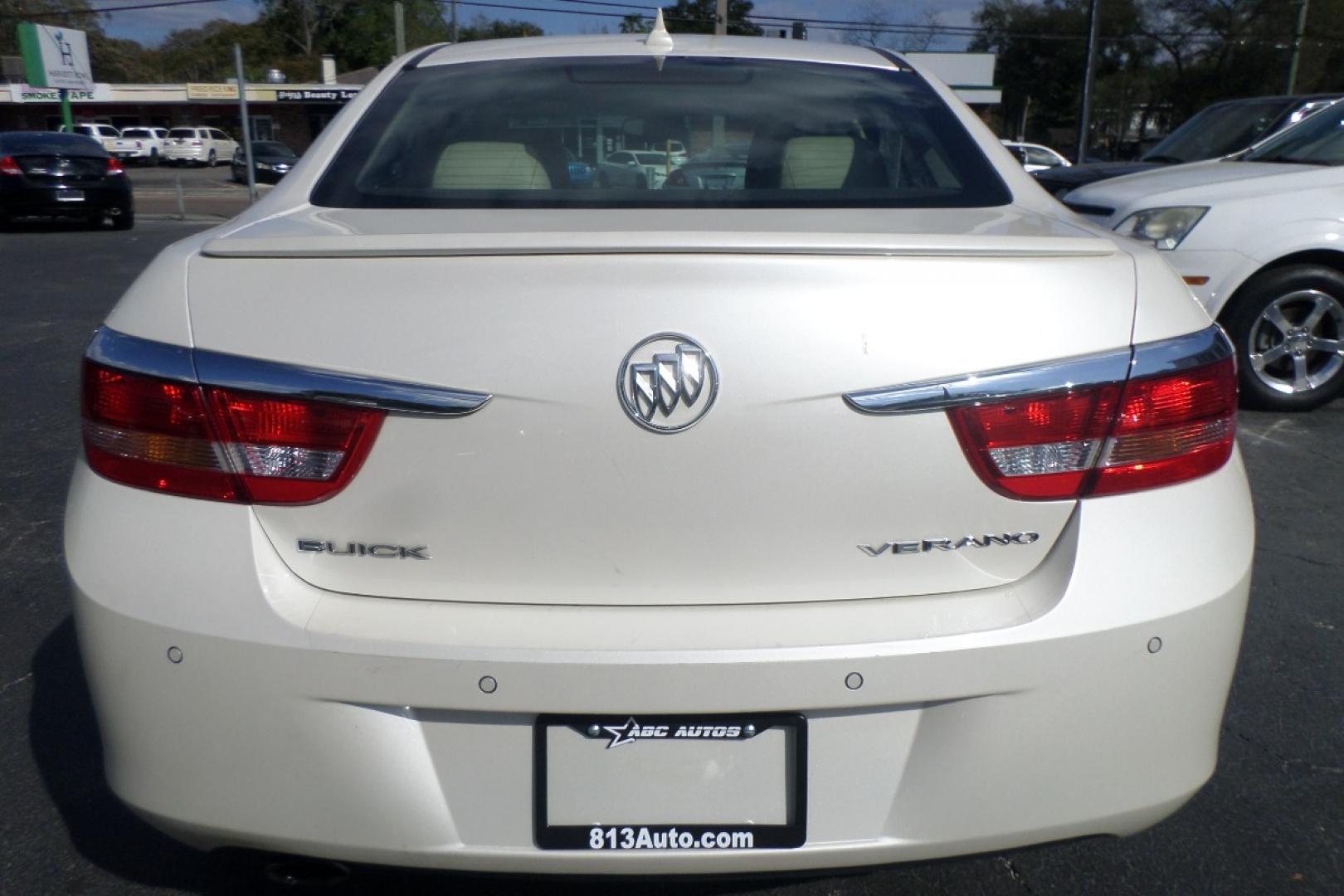 2012 White /Tan Buick Verano Leather (1G4PS5SK5C4) with an 2.4L L4 DOHC 16V FFV engine, 6-Speed Automatic transmission, located at 6112 N Florida Avenue, Tampa, FL, 33604, (888) 521-5131, 27.954929, -82.459534 - Photo#6