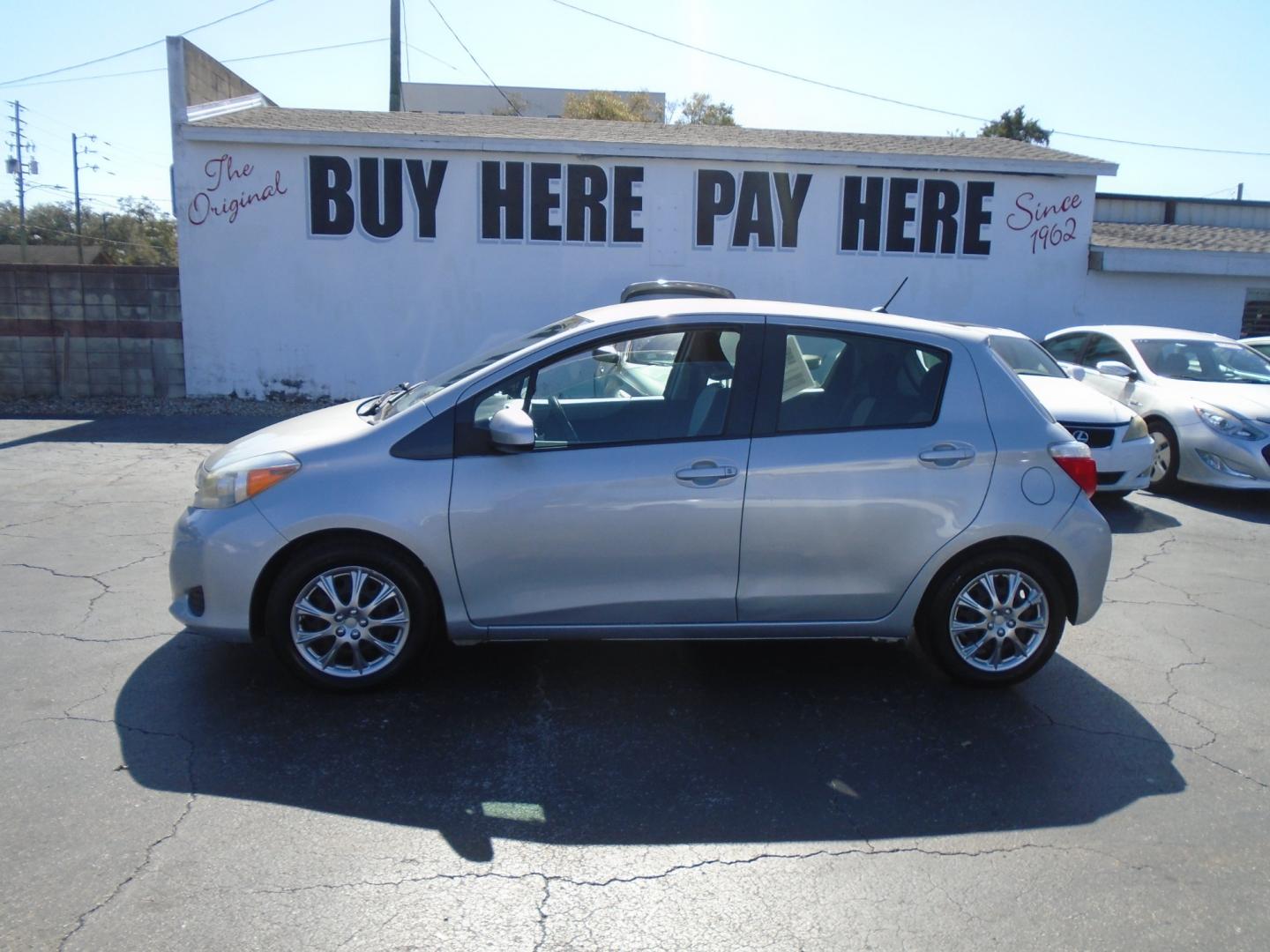 2012 SILVER TOYOTA YARIS (JTDKTUD36CD) with an L4 1.5L DOHC 16V VVT-I engine, located at 6112 N Florida Avenue, Tampa, FL, 33604, (888) 521-5131, 27.954929, -82.459534 - Photo#0