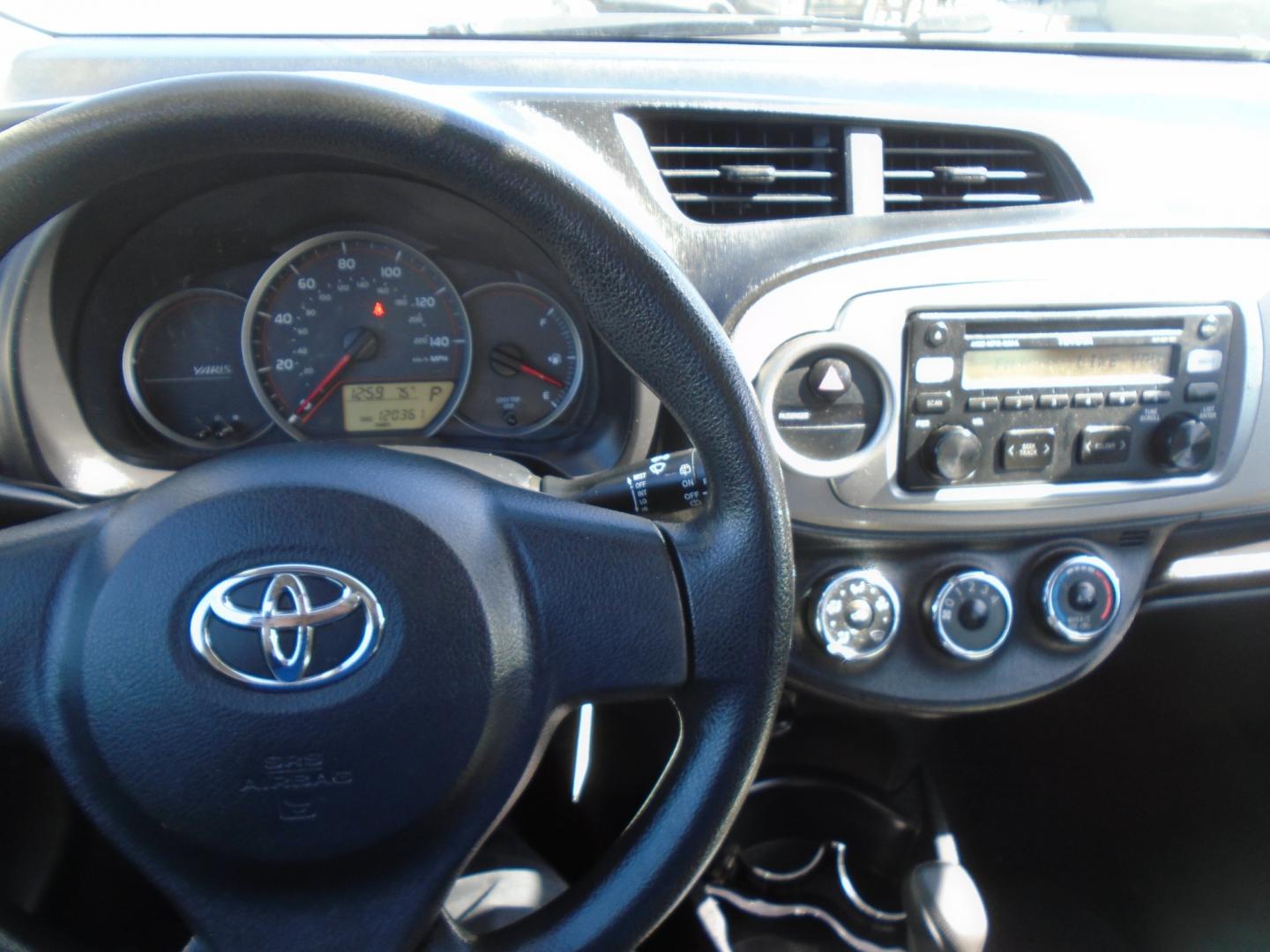 2012 SILVER TOYOTA YARIS (JTDKTUD36CD) with an L4 1.5L DOHC 16V VVT-I engine, located at 6112 N Florida Avenue, Tampa, FL, 33604, (888) 521-5131, 27.954929, -82.459534 - Photo#11