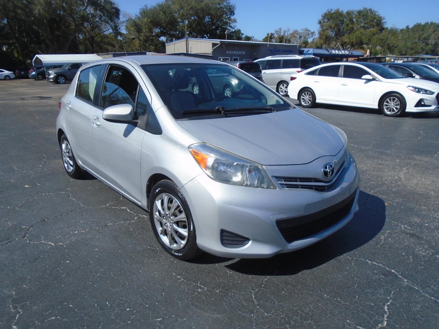 2012 SILVER TOYOTA YARIS (JTDKTUD36CD) with an L4 1.5L DOHC 16V VVT-I engine, located at 6112 N Florida Avenue, Tampa, FL, 33604, (888) 521-5131, 27.954929, -82.459534 - Photo#2