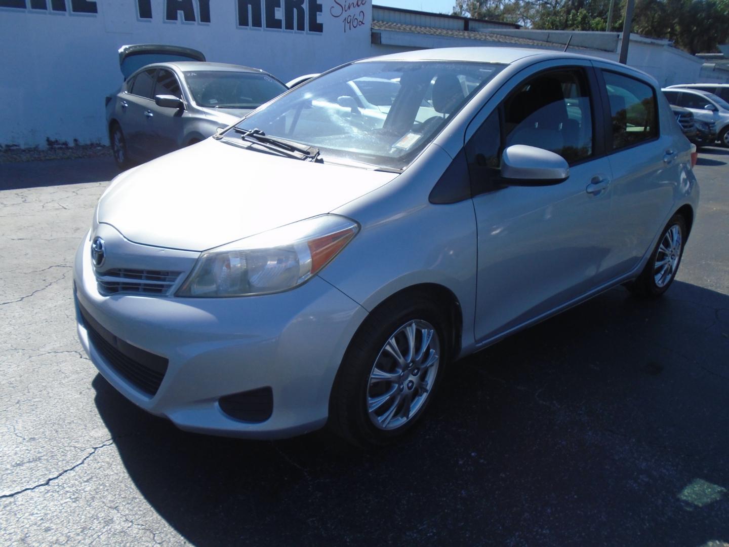 2012 SILVER TOYOTA YARIS (JTDKTUD36CD) with an L4 1.5L DOHC 16V VVT-I engine, located at 6112 N Florida Avenue, Tampa, FL, 33604, (888) 521-5131, 27.954929, -82.459534 - Photo#3