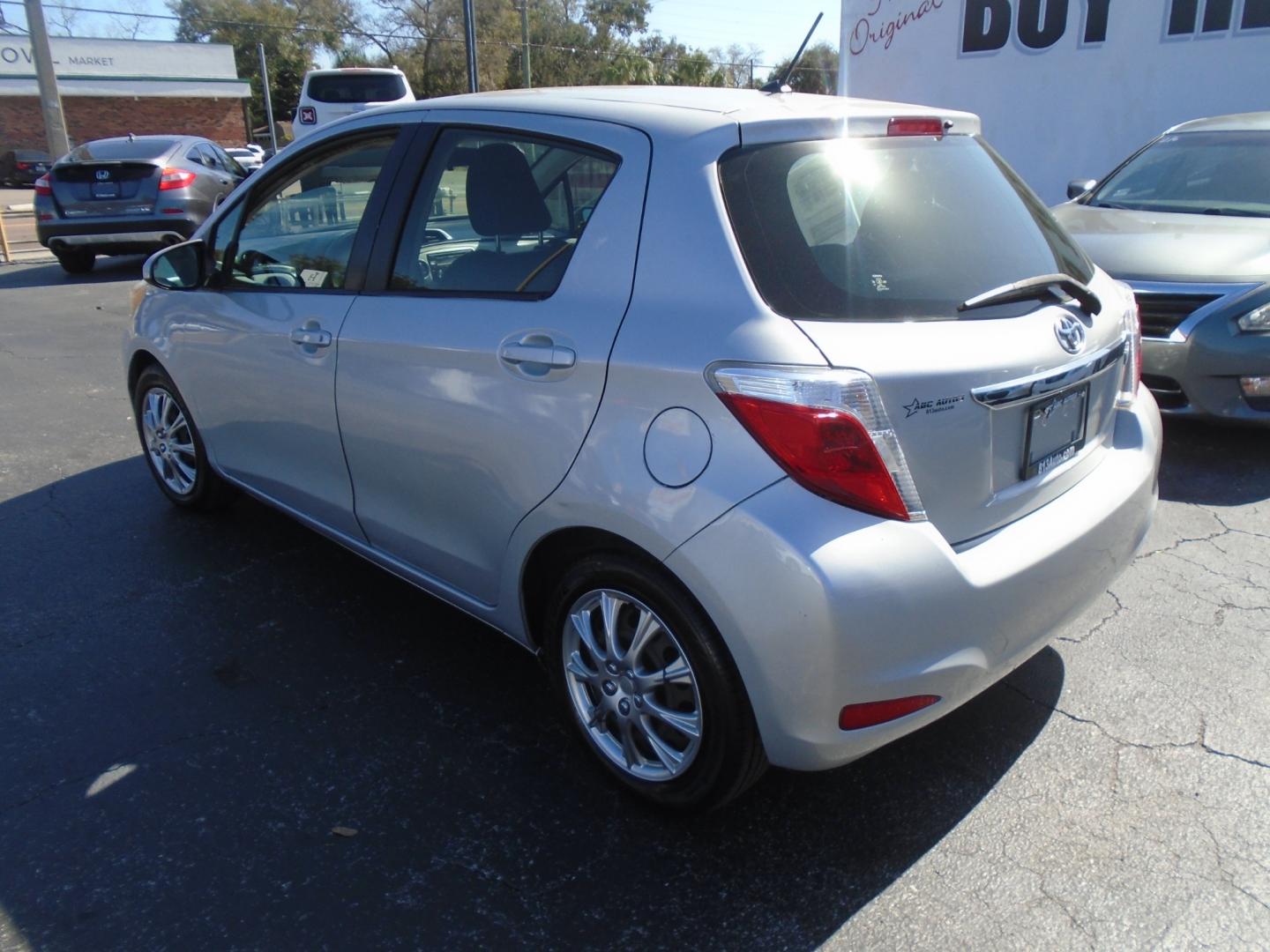 2012 SILVER TOYOTA YARIS (JTDKTUD36CD) with an L4 1.5L DOHC 16V VVT-I engine, located at 6112 N Florida Avenue, Tampa, FL, 33604, (888) 521-5131, 27.954929, -82.459534 - Photo#4