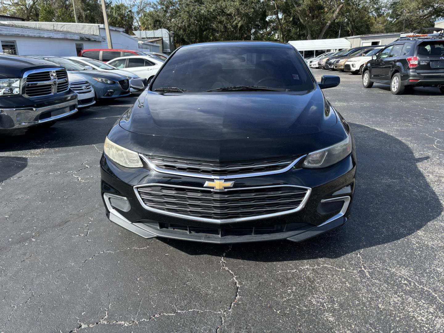 2017 BLACK /Grey Chevrolet Malibu LS (1G1ZB5STXHF) with an 1.5L L4 DOHC 16V engine, 6A transmission, located at 6112 N Florida Avenue, Tampa, FL, 33604, (888) 521-5131, 27.954929, -82.459534 - Photo#1