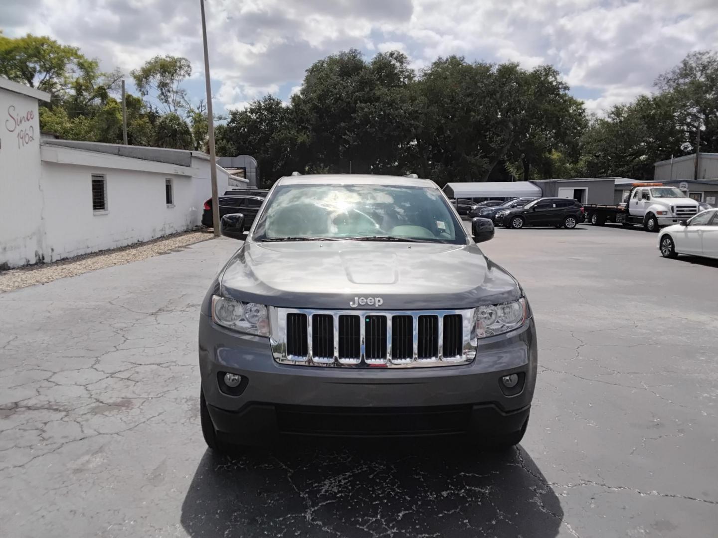 2013 SILVER /Grey Jeep Grand Cherokee Laredo 2WD (1C4RJEAG1DC) with an 3.6L V6 DOHC 24V engine, 5-Speed Automatic transmission, located at 6112 N Florida Avenue, Tampa, FL, 33604, (888) 521-5131, 27.954929, -82.459534 - $499 DOWN PLUS TAX & TAG. - Photo#1