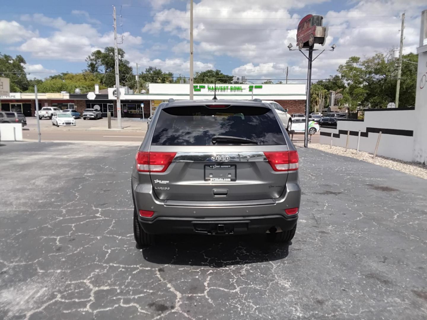 2013 SILVER /Grey Jeep Grand Cherokee Laredo 2WD (1C4RJEAG1DC) with an 3.6L V6 DOHC 24V engine, 5-Speed Automatic transmission, located at 6112 N Florida Avenue, Tampa, FL, 33604, (888) 521-5131, 27.954929, -82.459534 - $499 DOWN PLUS TAX & TAG. - Photo#3