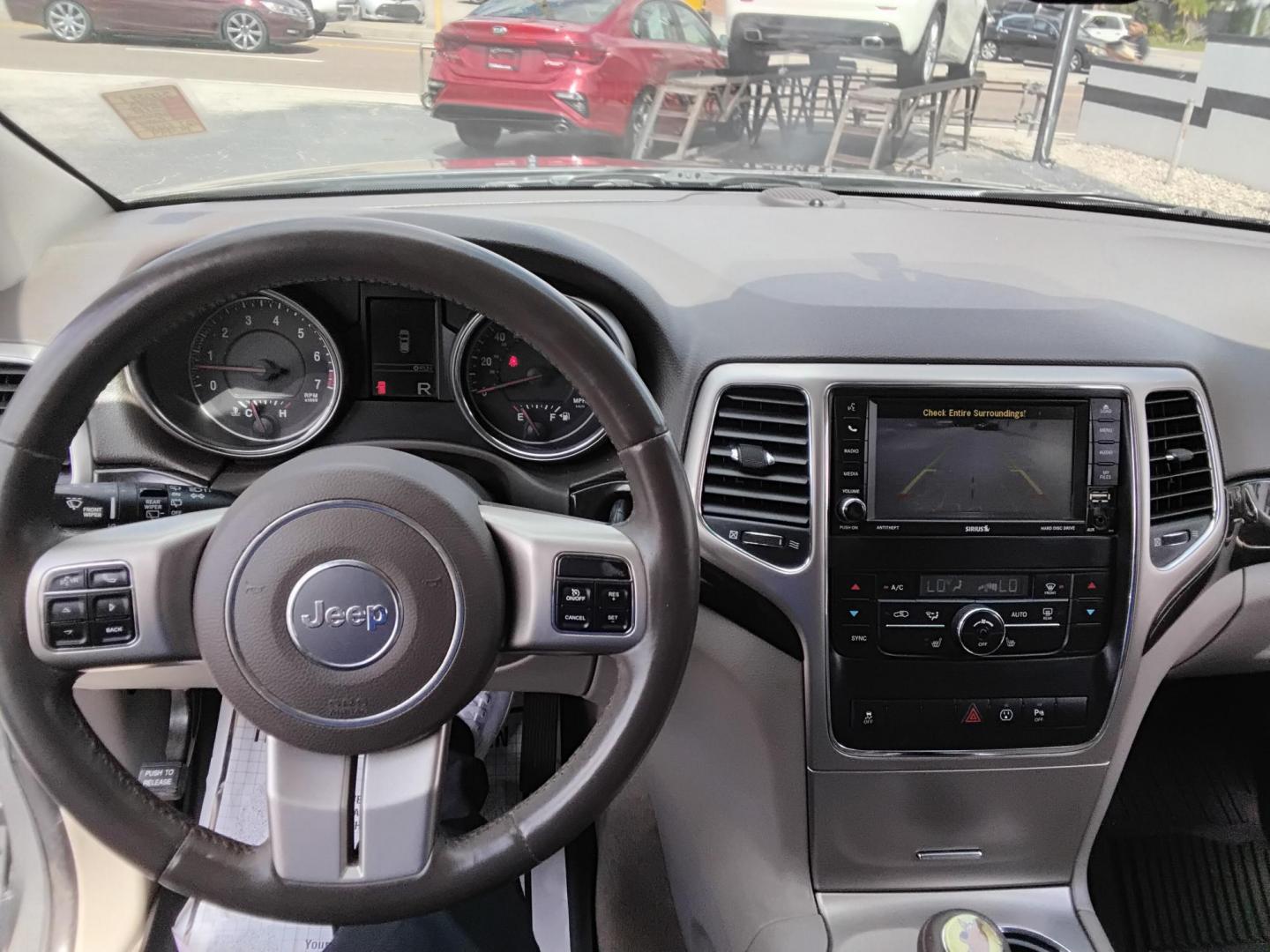 2013 SILVER /Grey Jeep Grand Cherokee Laredo 2WD (1C4RJEAG1DC) with an 3.6L V6 DOHC 24V engine, 5-Speed Automatic transmission, located at 6112 N Florida Avenue, Tampa, FL, 33604, (888) 521-5131, 27.954929, -82.459534 - $499 DOWN PLUS TAX & TAG. - Photo#6