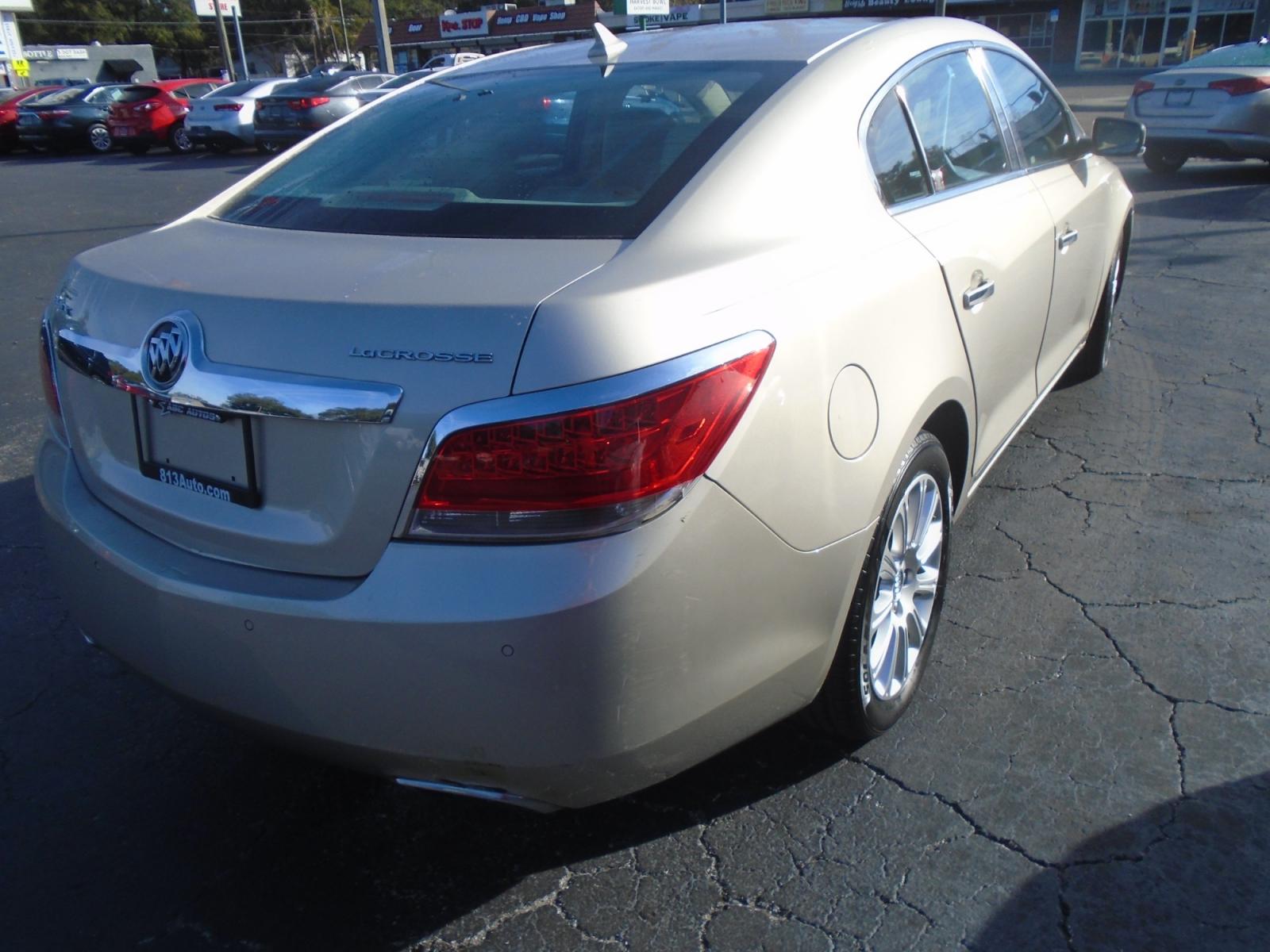 2013 GOLD /Tan Buick LaCrosse Leather Package (1G4GC5E34DF) with an 3.6L V6 DOHC 24V engine, 6-Speed Automatic transmission, located at 6112 N Florida Avenue, Tampa, FL, 33604, (888) 521-5131, 27.954929, -82.459534 - Photo #5