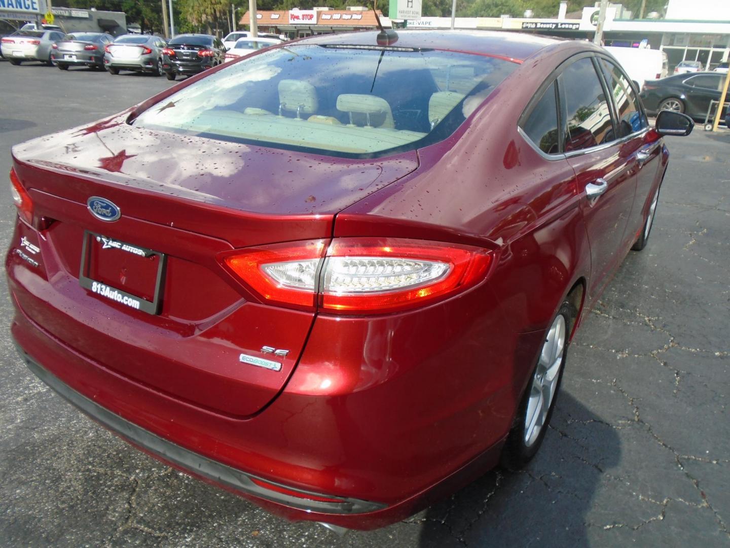 2015 RED /Beige Ford Fusion SE (1FA6P0H7XF5) with an 2.5L L4 DOHC 16V engine, located at 6112 N Florida Avenue, Tampa, FL, 33604, (888) 521-5131, 27.954929, -82.459534 - Photo#2