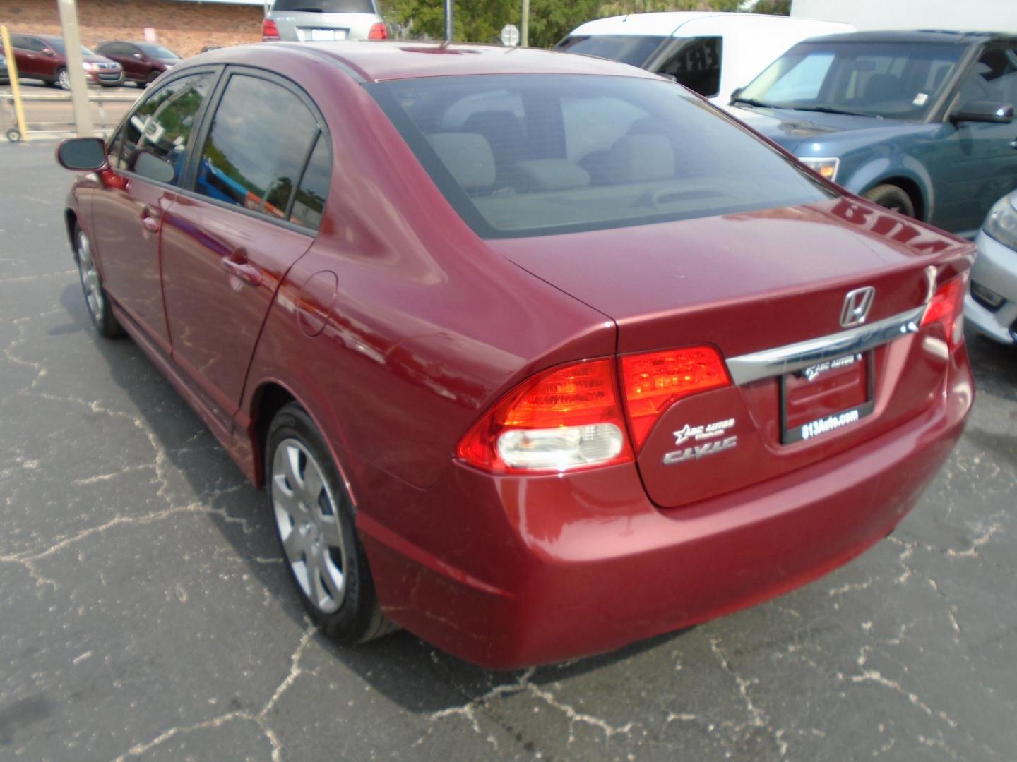 2010 Honda Civic LX Sedan 5-Speed AT (2HGFA1F56AH) with an 1.8L L4 SOHC 16V engine, 5-Speed Automatic transmission, located at 6112 N Florida Avenue, Tampa, FL, 33604, (888) 521-5131, 27.954929, -82.459534 - Photo#4