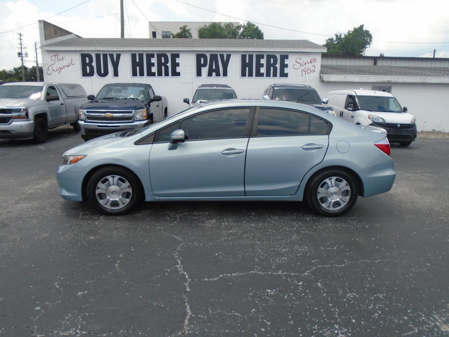 2012 Honda Civic Hybrid CVT AT-PZEV (JHMFB4F26CS) with an 1.3L L4 SOHC 8V HYBRID engine, Continuously Variable Transmission transmission, located at 6112 N Florida Avenue, Tampa, FL, 33604, (888) 521-5131, 27.954929, -82.459534 - Photo#0