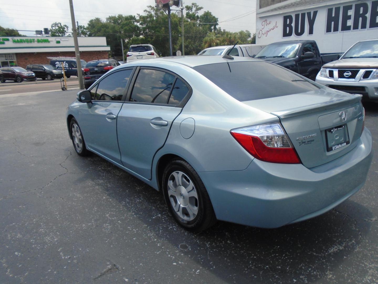 2012 Honda Civic Hybrid CVT AT-PZEV (JHMFB4F26CS) with an 1.3L L4 SOHC 8V HYBRID engine, Continuously Variable Transmission transmission, located at 6112 N Florida Avenue, Tampa, FL, 33604, (888) 521-5131, 27.954929, -82.459534 - Photo#16