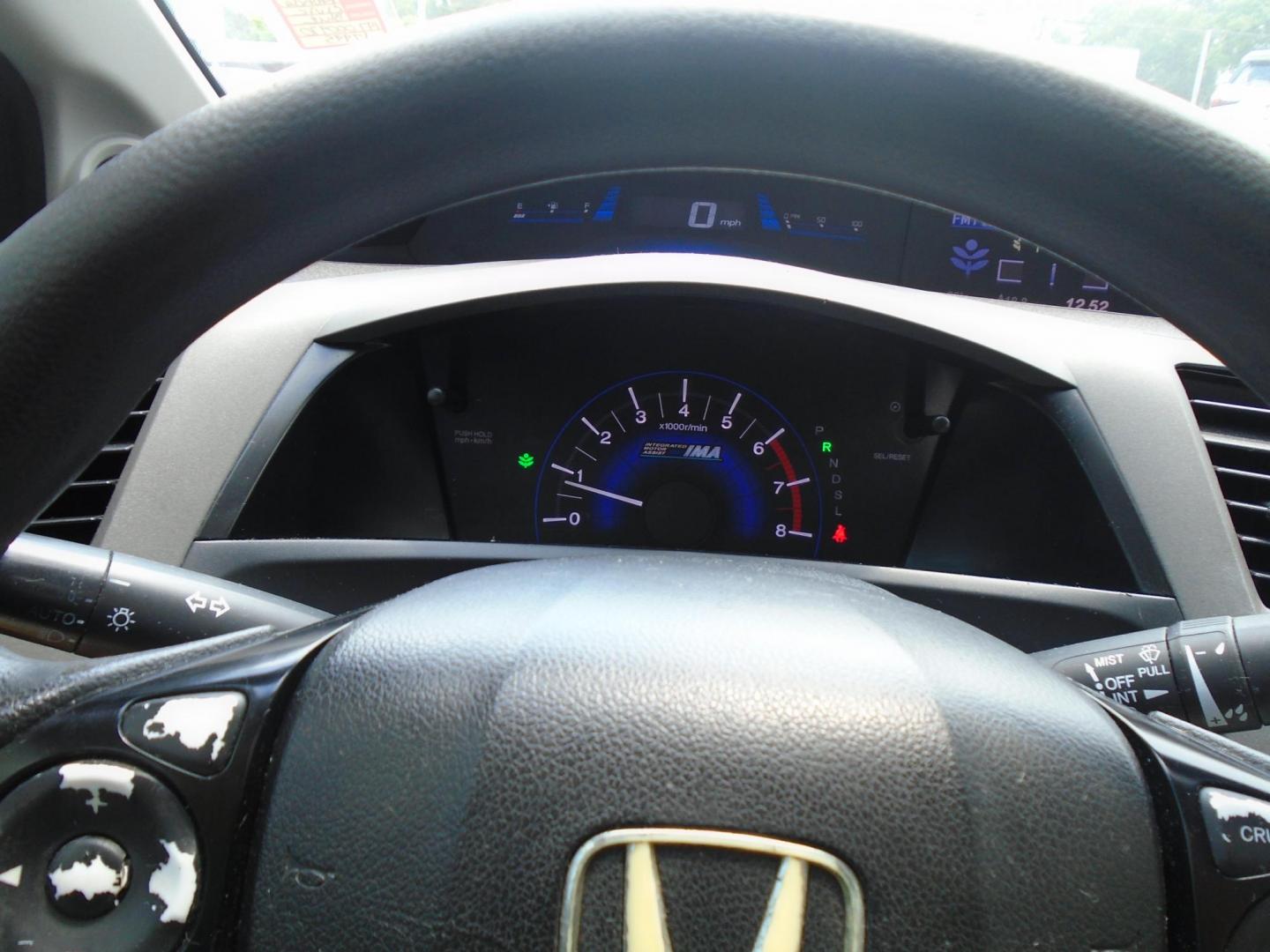 2012 Honda Civic Hybrid CVT AT-PZEV (JHMFB4F26CS) with an 1.3L L4 SOHC 8V HYBRID engine, Continuously Variable Transmission transmission, located at 6112 N Florida Avenue, Tampa, FL, 33604, (888) 521-5131, 27.954929, -82.459534 - Photo#17