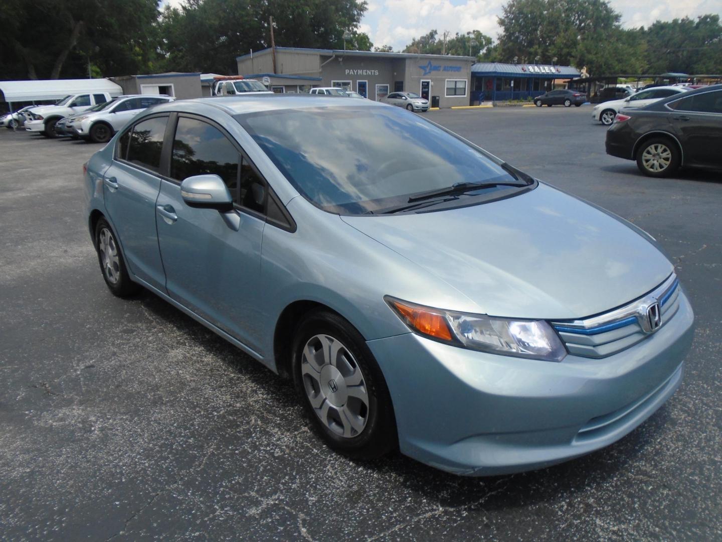 2012 Honda Civic Hybrid CVT AT-PZEV (JHMFB4F26CS) with an 1.3L L4 SOHC 8V HYBRID engine, Continuously Variable Transmission transmission, located at 6112 N Florida Avenue, Tampa, FL, 33604, (888) 521-5131, 27.954929, -82.459534 - Photo#10