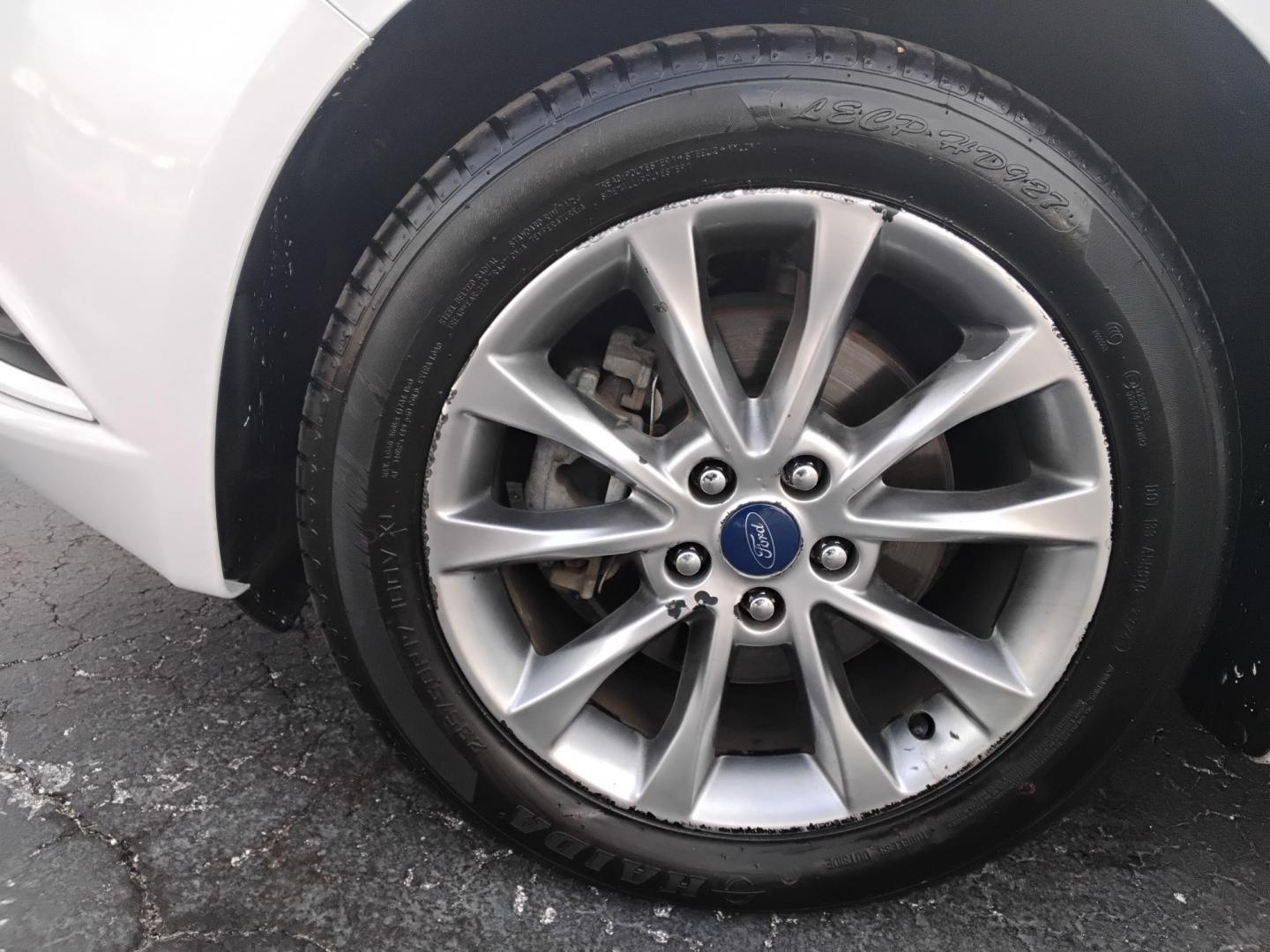 2017 White /Grey Ford Fusion SE (3FA6P0H70HR) with an 2.5L L4 DOHC 16V engine, 6A transmission, located at 6112 N Florida Avenue, Tampa, FL, 33604, (888) 521-5131, 27.954929, -82.459534 - $499 DOWN PLUS TAX & TAG. - Photo#13