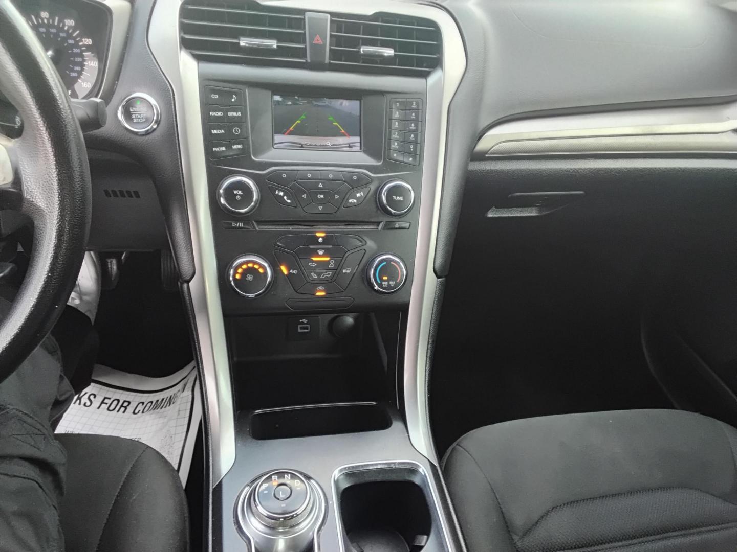 2017 White /Grey Ford Fusion SE (3FA6P0H70HR) with an 2.5L L4 DOHC 16V engine, 6A transmission, located at 6112 N Florida Avenue, Tampa, FL, 33604, (888) 521-5131, 27.954929, -82.459534 - $499 DOWN PLUS TAX & TAG. - Photo#9