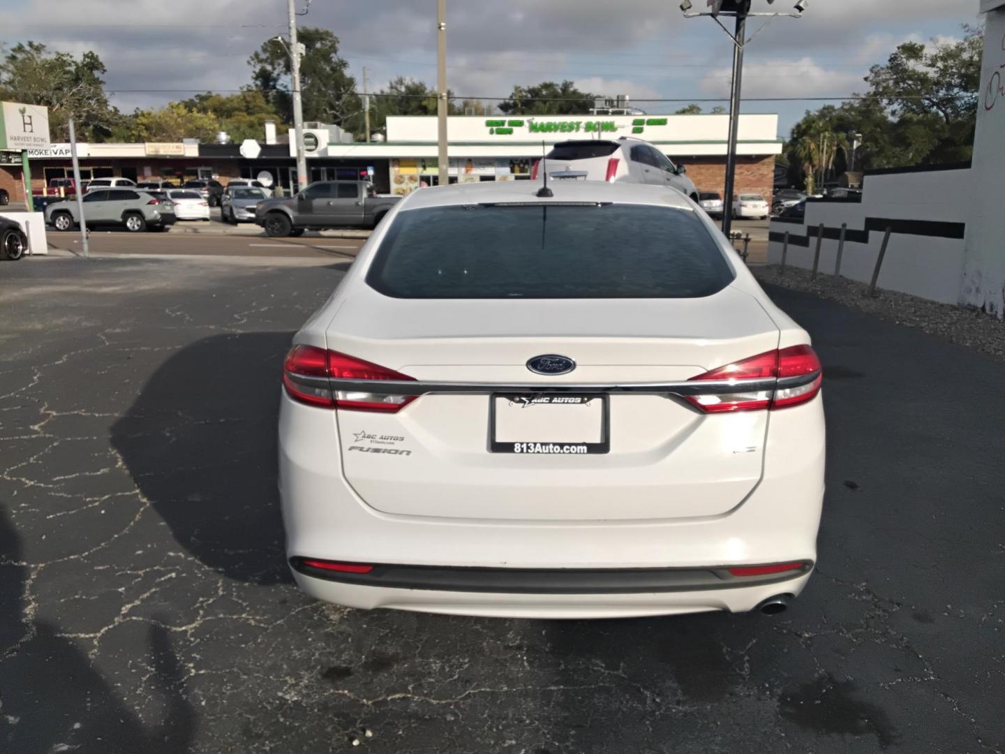 2017 White /Grey Ford Fusion SE (3FA6P0H70HR) with an 2.5L L4 DOHC 16V engine, 6A transmission, located at 6112 N Florida Avenue, Tampa, FL, 33604, (888) 521-5131, 27.954929, -82.459534 - $499 DOWN PLUS TAX & TAG. - Photo#6