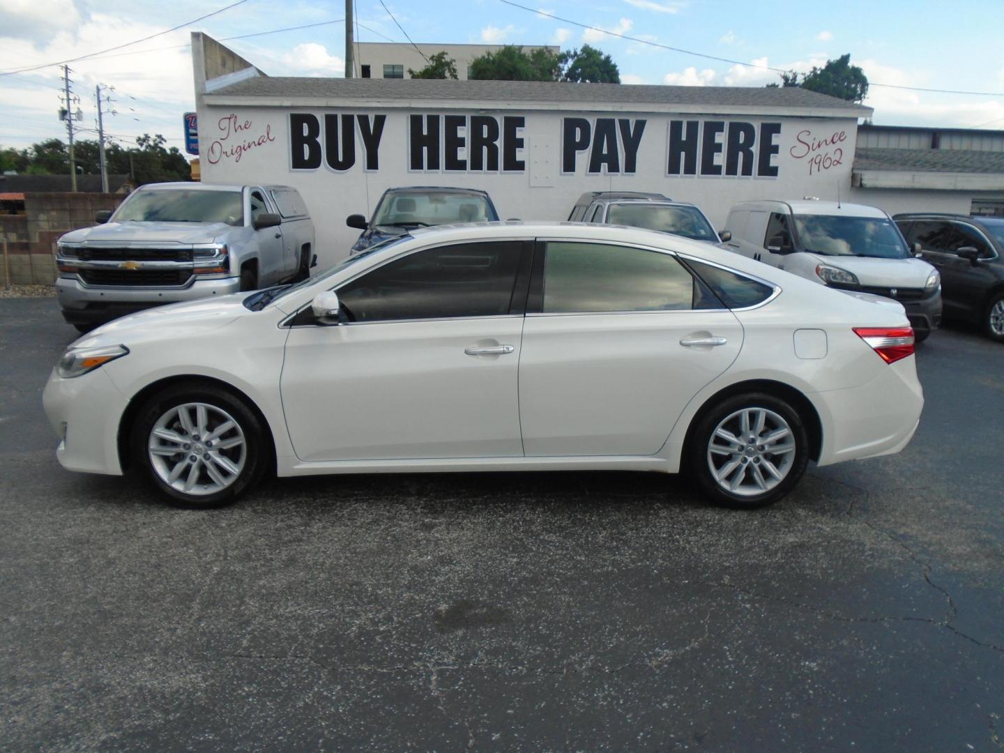 2014 Toyota Avalon XLE (4T1BK1EB1EU) with an 3.5L V6 DOHC 24V engine, 6-Speed Automatic transmission, located at 6112 N Florida Avenue, Tampa, FL, 33604, (888) 521-5131, 27.954929, -82.459534 - Photo#0