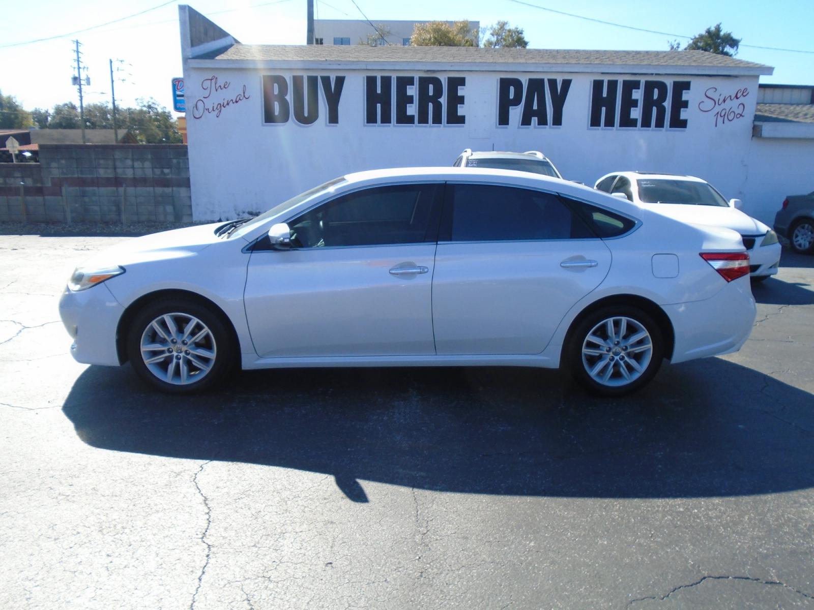 2014 Toyota Avalon XLE (4T1BK1EB1EU) with an 3.5L V6 DOHC 24V engine, 6-Speed Automatic transmission, located at 6112 N Florida Avenue, Tampa, FL, 33604, (888) 521-5131, 27.954929, -82.459534 - Photo #0