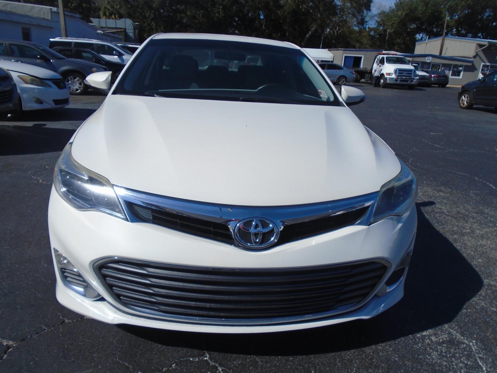 2014 Toyota Avalon XLE (4T1BK1EB1EU) with an 3.5L V6 DOHC 24V engine, 6-Speed Automatic transmission, located at 6112 N Florida Avenue, Tampa, FL, 33604, (888) 521-5131, 27.954929, -82.459534 - Photo #1