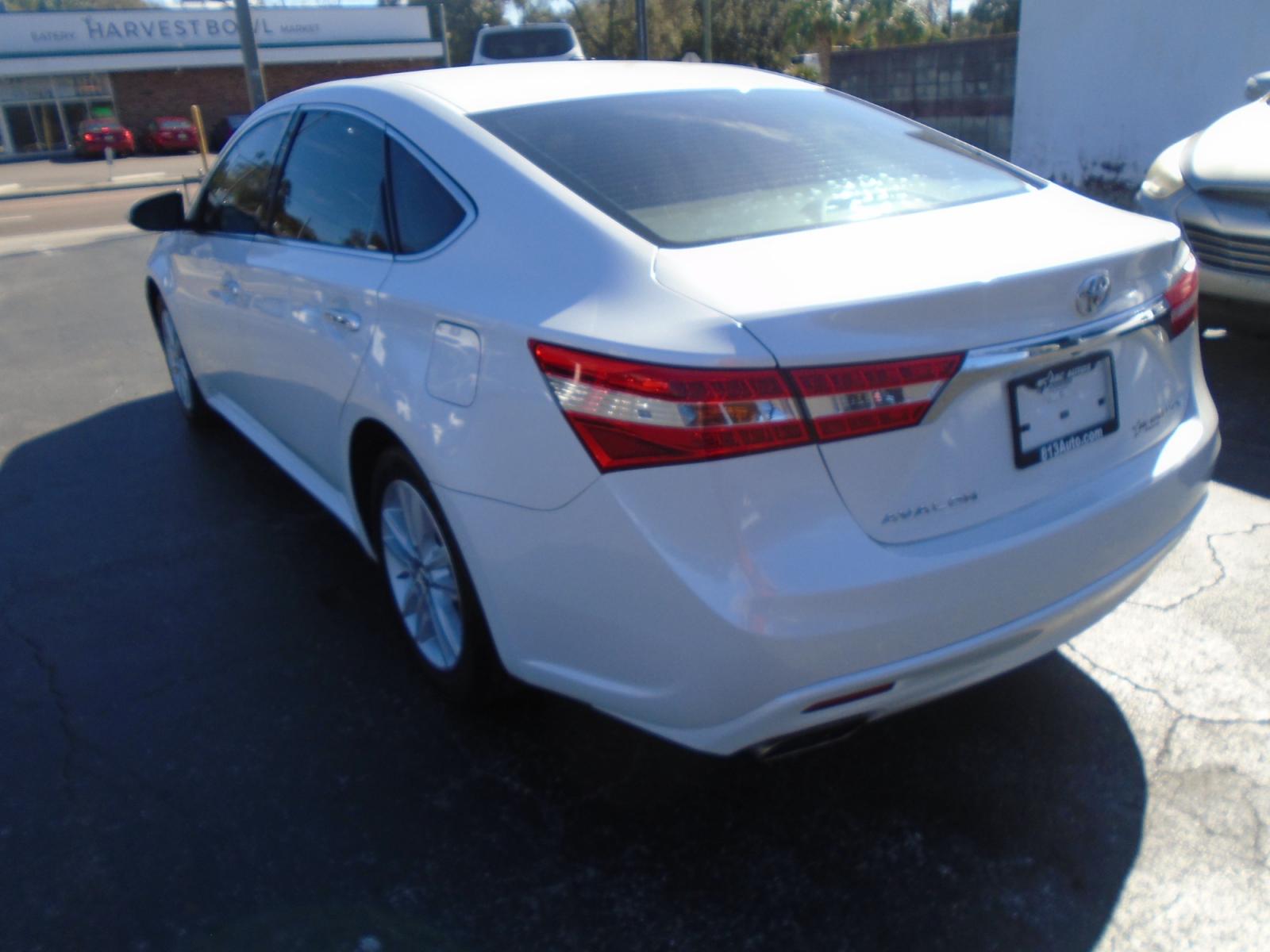 2014 Toyota Avalon XLE (4T1BK1EB1EU) with an 3.5L V6 DOHC 24V engine, 6-Speed Automatic transmission, located at 6112 N Florida Avenue, Tampa, FL, 33604, (888) 521-5131, 27.954929, -82.459534 - Photo #4