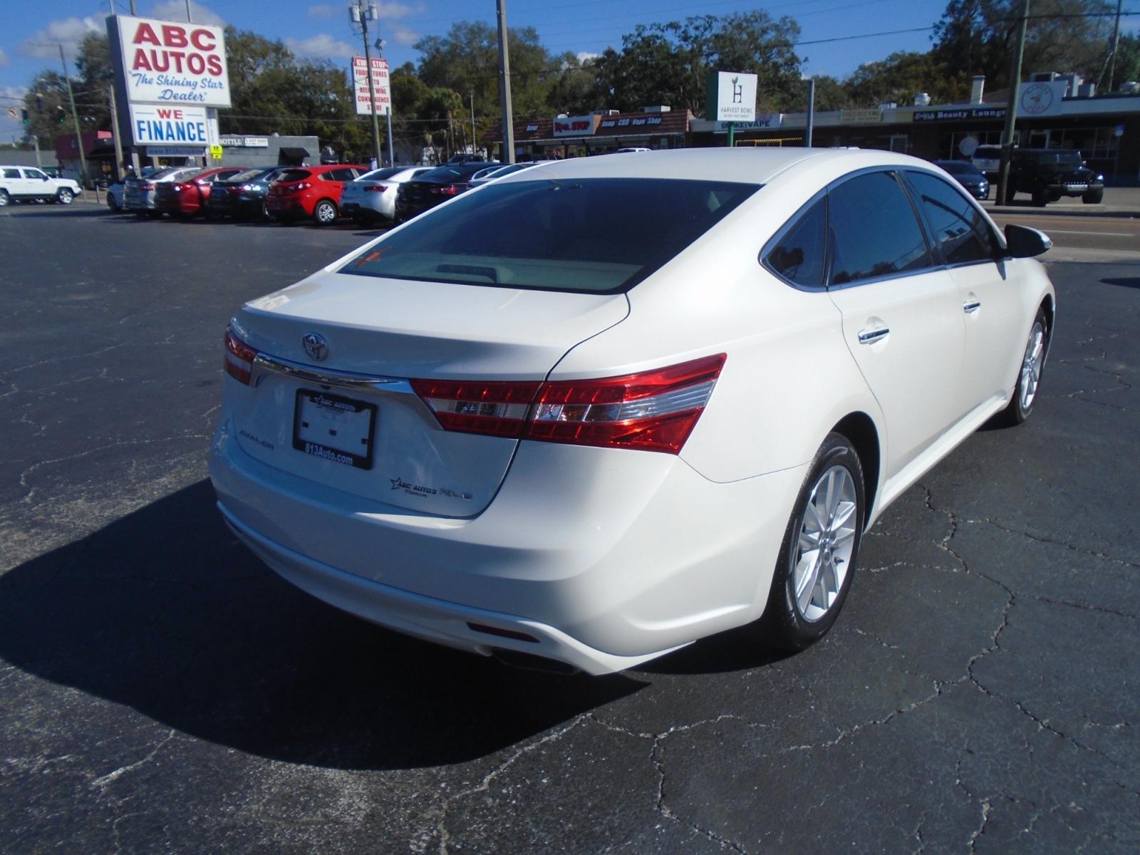 2014 Toyota Avalon XLE (4T1BK1EB1EU) with an 3.5L V6 DOHC 24V engine, 6-Speed Automatic transmission, located at 6112 N Florida Avenue, Tampa, FL, 33604, (888) 521-5131, 27.954929, -82.459534 - Photo #5