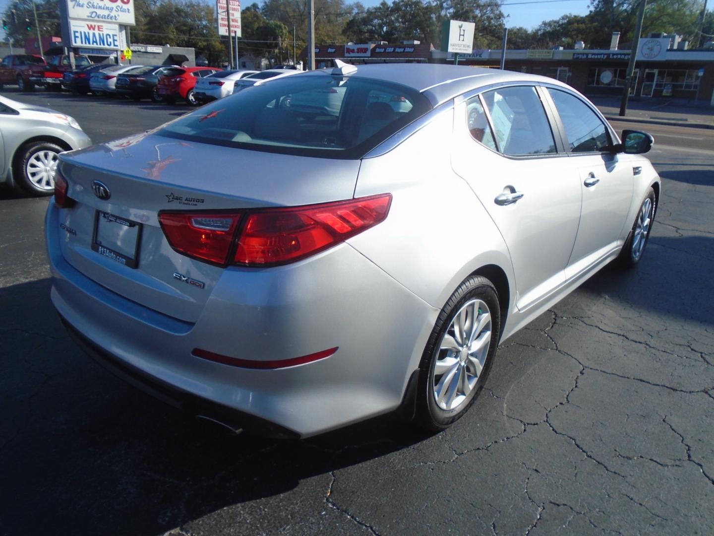 2014 Kia Optima EX (5XXGN4A73EG) with an 2.4L L4 DOHC 16V engine, 6-Speed Automatic transmission, located at 6112 N Florida Avenue, Tampa, FL, 33604, (888) 521-5131, 27.954929, -82.459534 - Photo#5