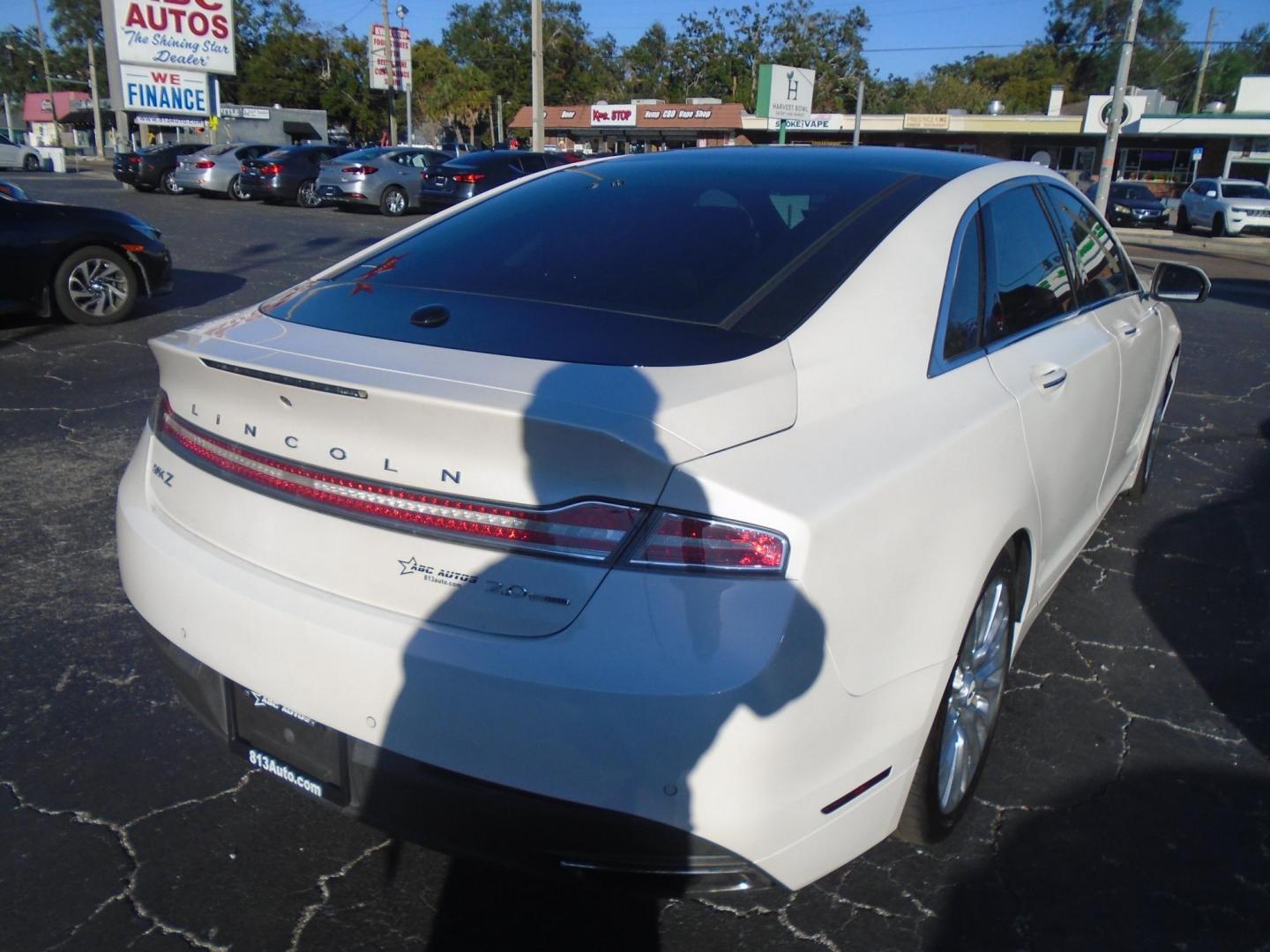 2016 Lincoln MKZ FWD (3LN6L2G94GR) with an 2.0L L4 DOHC 16V engine, 6A transmission, located at 6112 N Florida Avenue, Tampa, FL, 33604, (888) 521-5131, 27.954929, -82.459534 - Photo#3