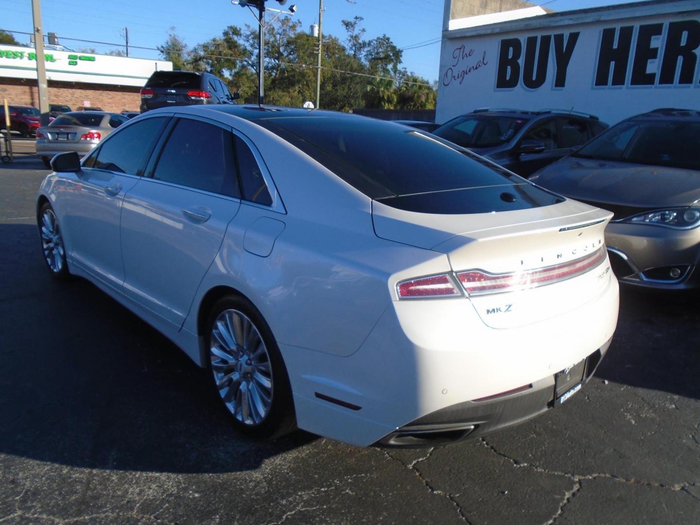 2016 Lincoln MKZ FWD (3LN6L2G94GR) with an 2.0L L4 DOHC 16V engine, 6A transmission, located at 6112 N Florida Avenue, Tampa, FL, 33604, (888) 521-5131, 27.954929, -82.459534 - Photo#4