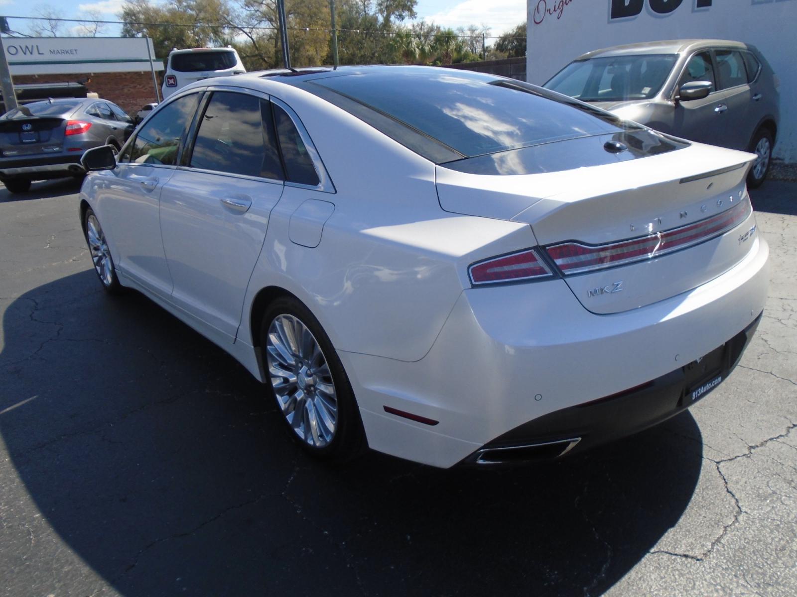 2016 Lincoln MKZ FWD (3LN6L2G94GR) with an 2.0L L4 DOHC 16V engine, 6A transmission, located at 6112 N Florida Avenue, Tampa, FL, 33604, (888) 521-5131, 27.954929, -82.459534 - Photo #4