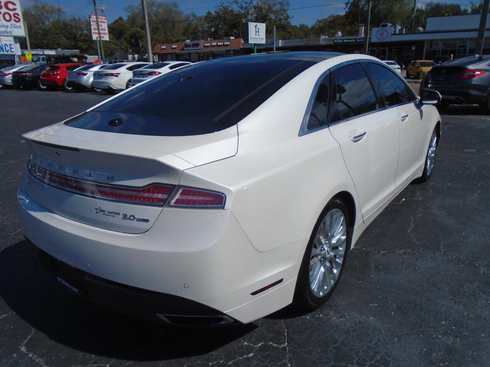 2016 Lincoln MKZ FWD (3LN6L2G94GR) with an 2.0L L4 DOHC 16V engine, 6A transmission, located at 6112 N Florida Avenue, Tampa, FL, 33604, (888) 521-5131, 27.954929, -82.459534 - Photo #5