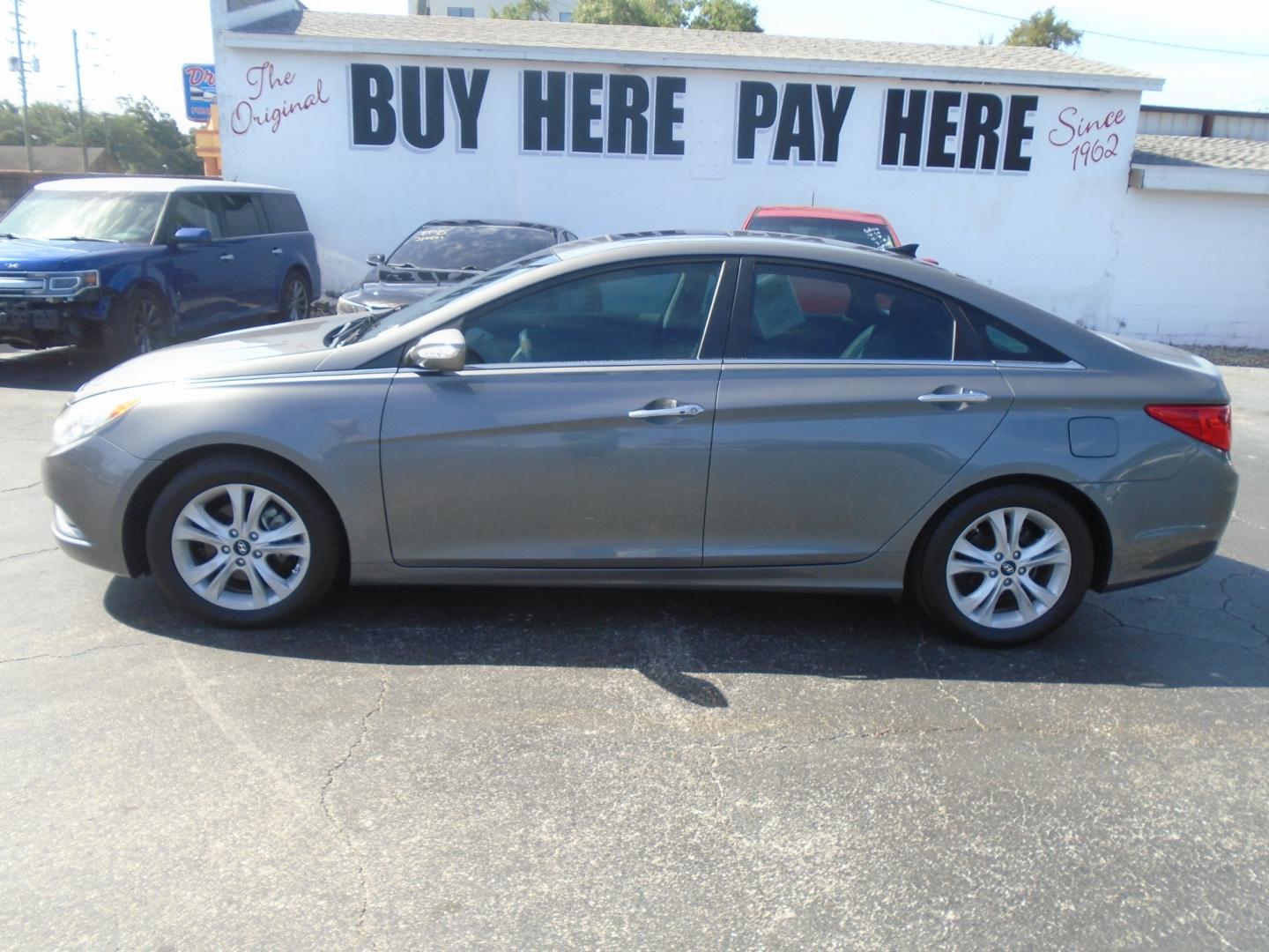 2013 Hyundai Sonata Limited Auto (5NPEC4AC1DH) with an 2.4L L4 DOHC 16V engine, 6-Speed Automatic transmission, located at 6112 N Florida Avenue, Tampa, FL, 33604, (888) 521-5131, 27.954929, -82.459534 - Photo#0