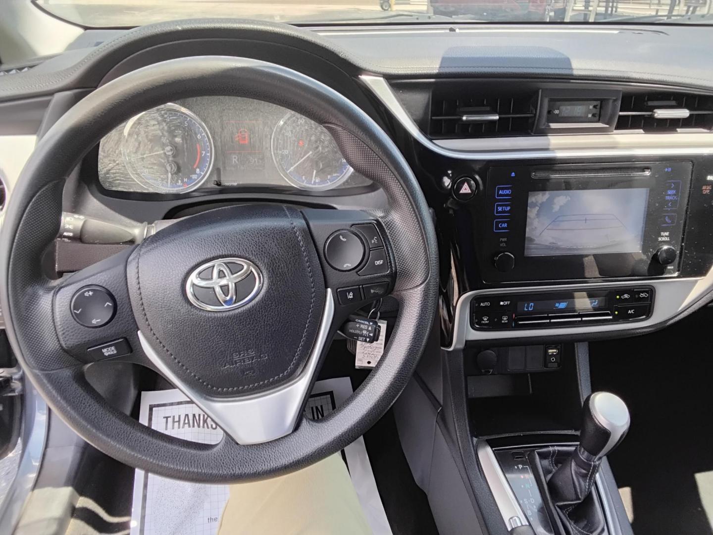 2017 GRAY /Beige Toyota Corolla L CVT (2T1BURHE8HC) with an 1.8L L4 DOHC 16V engine, CVT transmission, located at 6112 N Florida Avenue, Tampa, FL, 33604, (888) 521-5131, 27.954929, -82.459534 - $499 DOWN PLUS TAX & TAG.- Photo#5