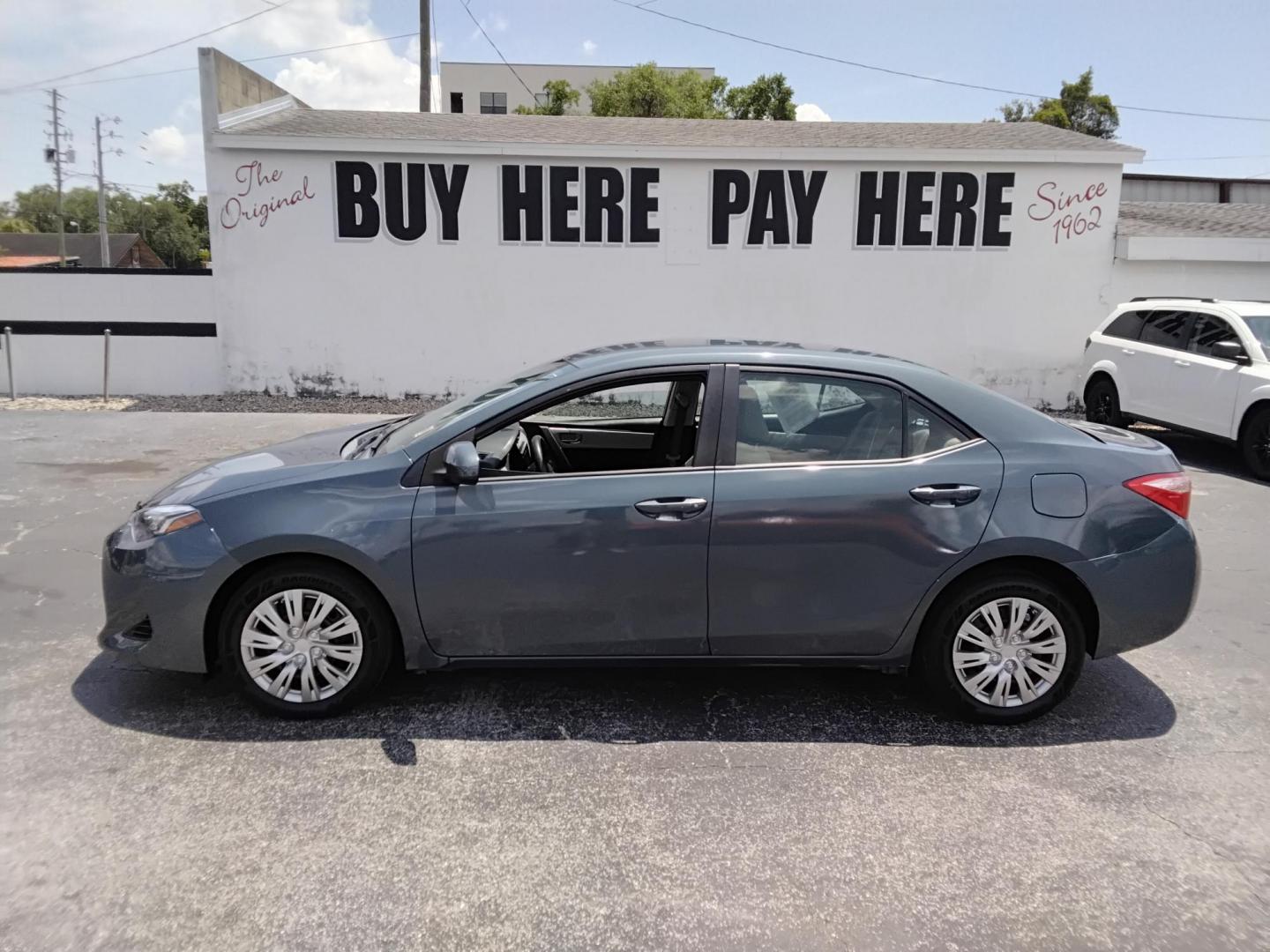 2017 GRAY /Beige Toyota Corolla L CVT (2T1BURHE8HC) with an 1.8L L4 DOHC 16V engine, CVT transmission, located at 6112 N Florida Avenue, Tampa, FL, 33604, (888) 521-5131, 27.954929, -82.459534 - $499 DOWN PLUS TAX & TAG.- Photo#0