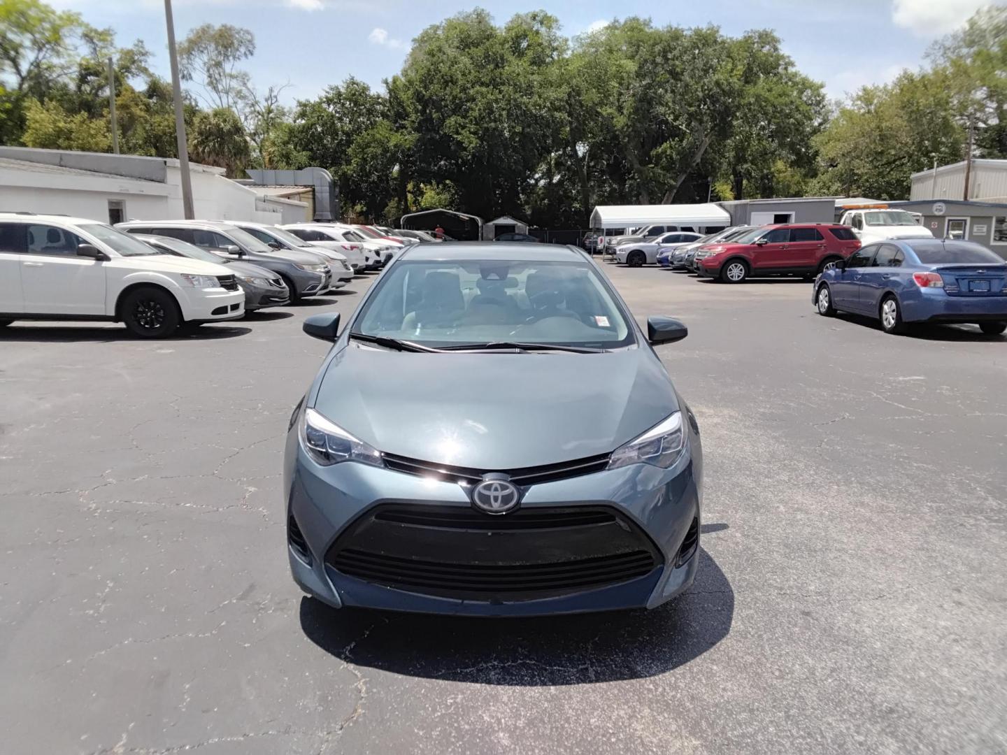 2017 GRAY /Beige Toyota Corolla L CVT (2T1BURHE8HC) with an 1.8L L4 DOHC 16V engine, CVT transmission, located at 6112 N Florida Avenue, Tampa, FL, 33604, (888) 521-5131, 27.954929, -82.459534 - $499 DOWN PLUS TAX & TAG.- Photo#1