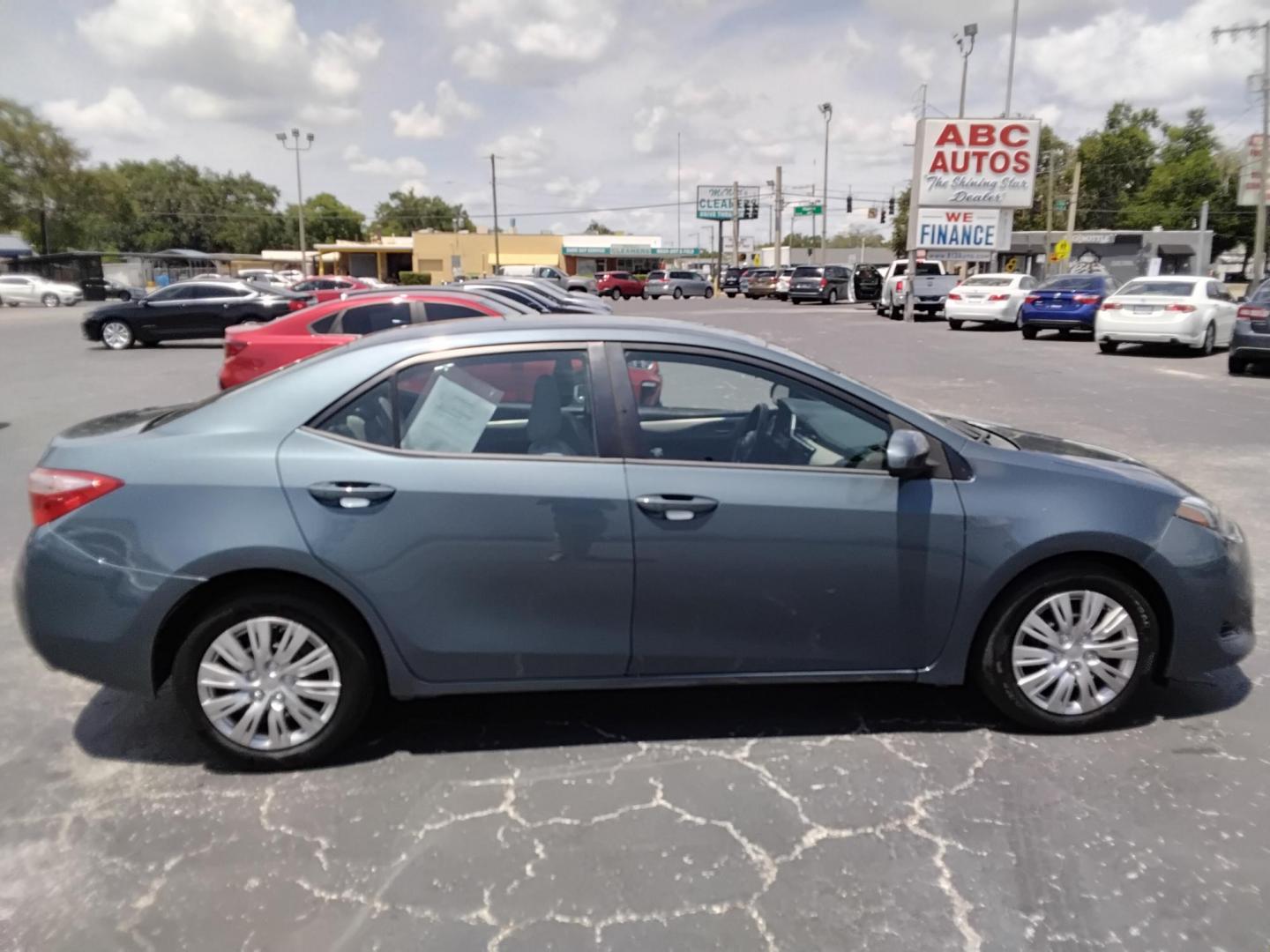 2017 GRAY /Beige Toyota Corolla L CVT (2T1BURHE8HC) with an 1.8L L4 DOHC 16V engine, CVT transmission, located at 6112 N Florida Avenue, Tampa, FL, 33604, (888) 521-5131, 27.954929, -82.459534 - $499 DOWN PLUS TAX & TAG.- Photo#2