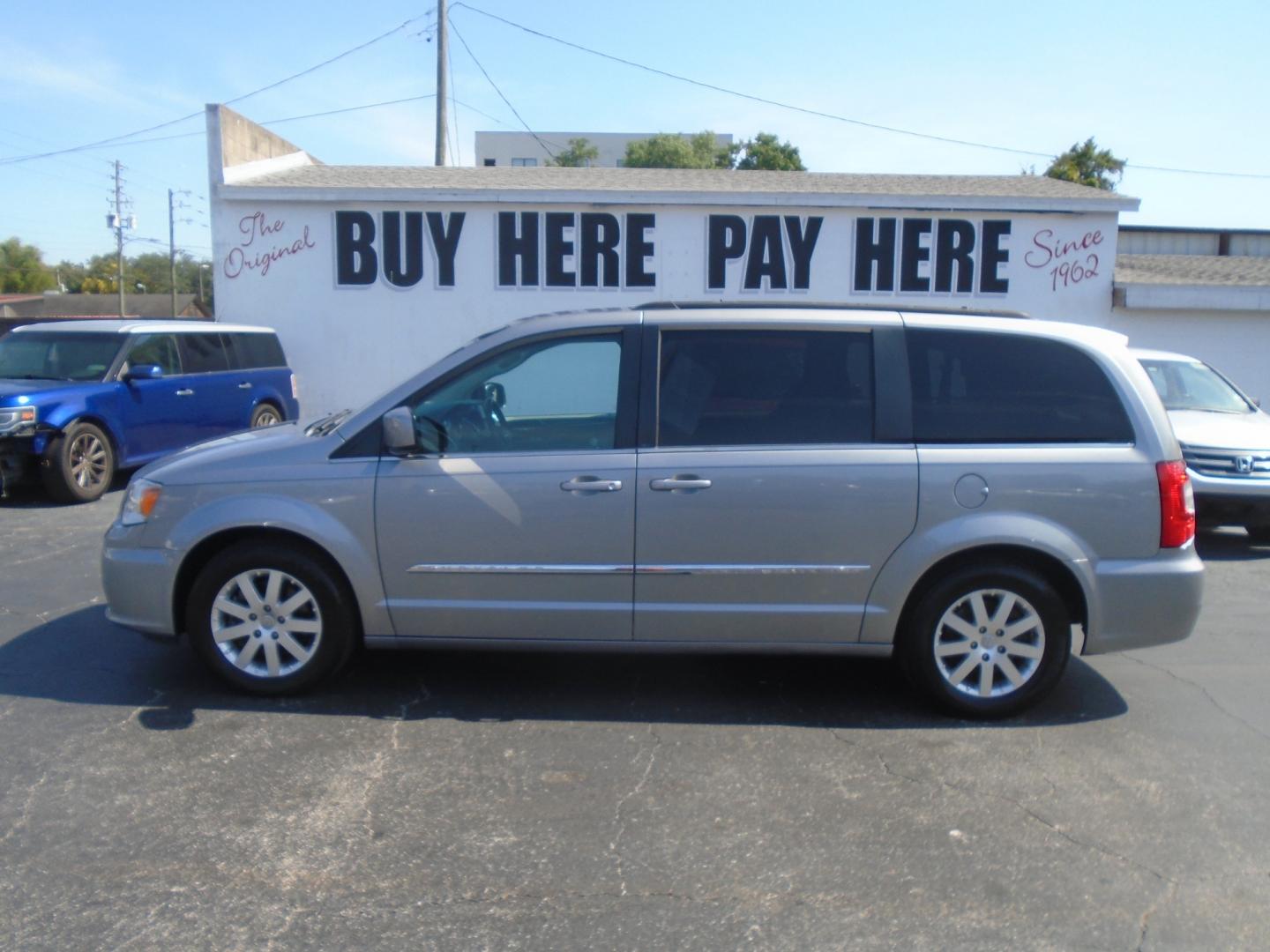 2016 Chrysler Town & Country Touring (2C4RC1BGXGR) with an 3.6L V6 DOHC 24V engine, 6A transmission, located at 6112 N Florida Avenue, Tampa, FL, 33604, (888) 521-5131, 27.954929, -82.459534 - Photo#0