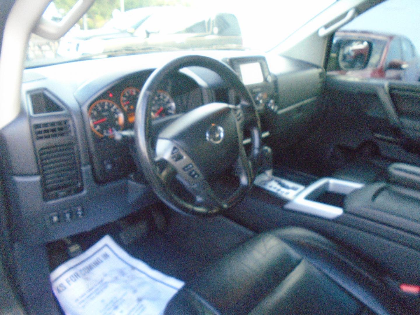 2013 Nissan Titan SV Crew Cab 2WD (1N6BA0ED1DN) with an 5.6L V8 DOHC 32V FFV engine, 5-Speed Automatic transmission, located at 6112 N Florida Avenue, Tampa, FL, 33604, (888) 521-5131, 27.954929, -82.459534 - Photo#10