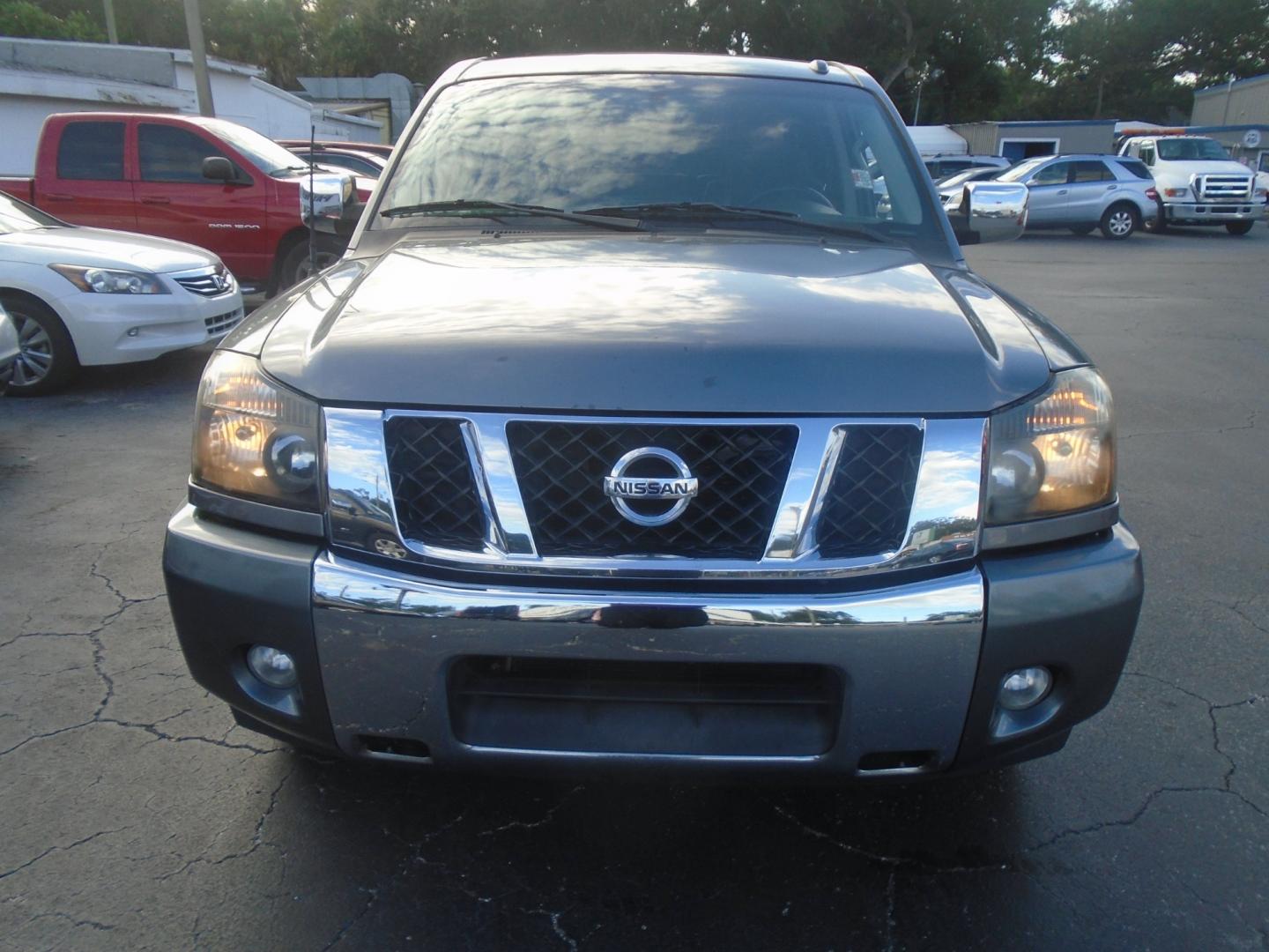 2013 Nissan Titan SV Crew Cab 2WD (1N6BA0ED1DN) with an 5.6L V8 DOHC 32V FFV engine, 5-Speed Automatic transmission, located at 6112 N Florida Avenue, Tampa, FL, 33604, (888) 521-5131, 27.954929, -82.459534 - Photo#2