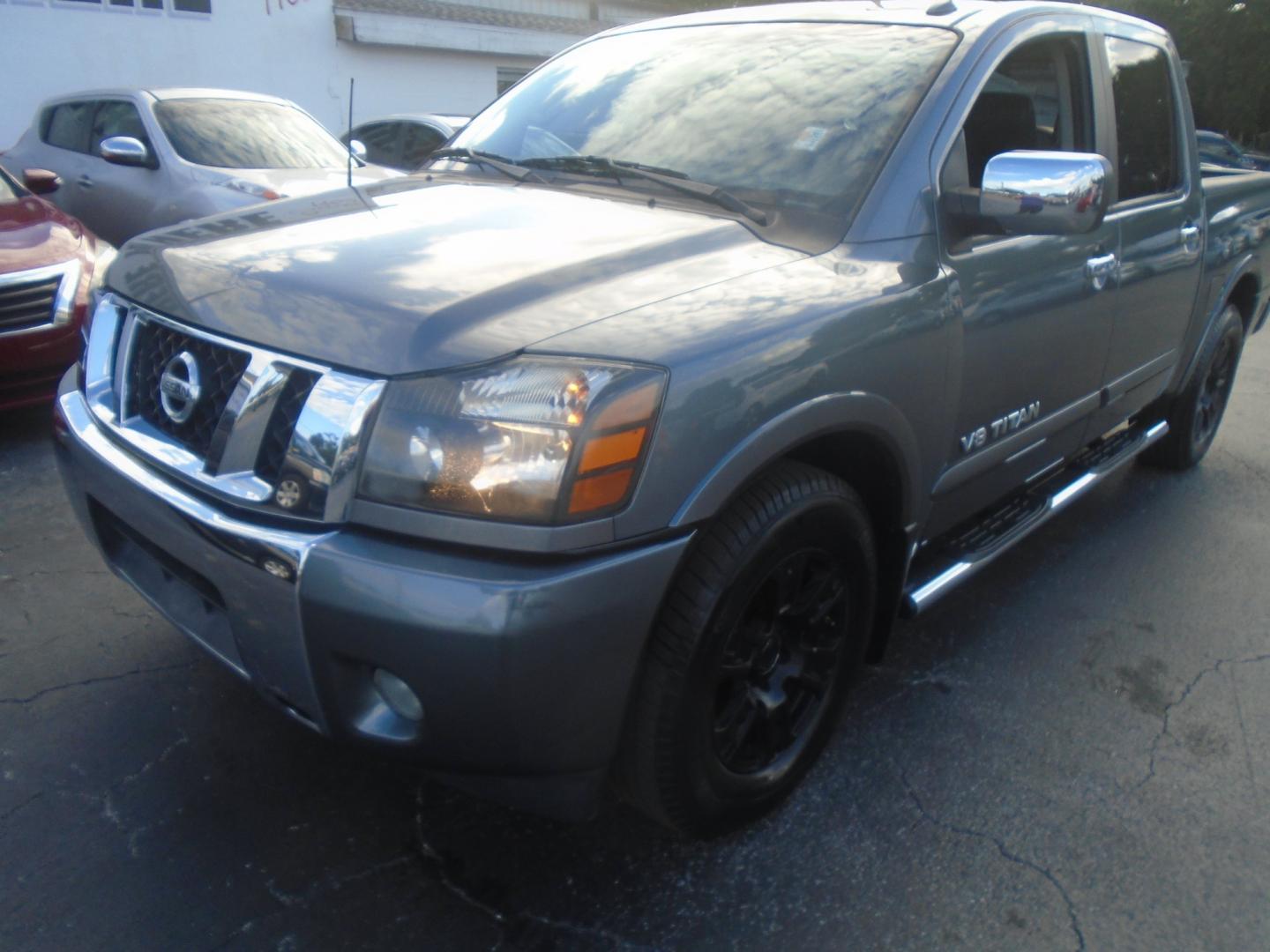 2013 Nissan Titan SV Crew Cab 2WD (1N6BA0ED1DN) with an 5.6L V8 DOHC 32V FFV engine, 5-Speed Automatic transmission, located at 6112 N Florida Avenue, Tampa, FL, 33604, (888) 521-5131, 27.954929, -82.459534 - Photo#5