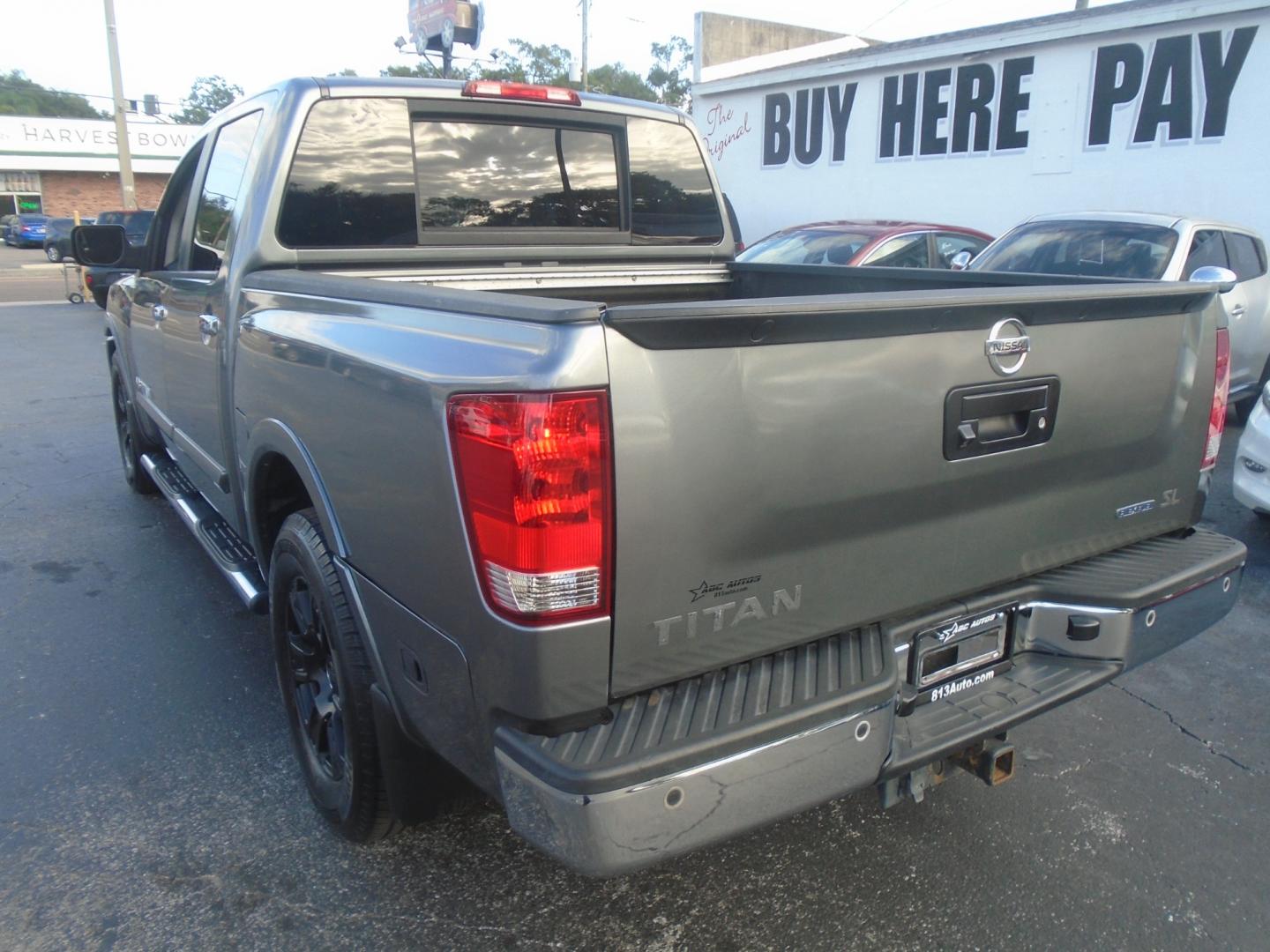 2013 Nissan Titan SV Crew Cab 2WD (1N6BA0ED1DN) with an 5.6L V8 DOHC 32V FFV engine, 5-Speed Automatic transmission, located at 6112 N Florida Avenue, Tampa, FL, 33604, (888) 521-5131, 27.954929, -82.459534 - Photo#7