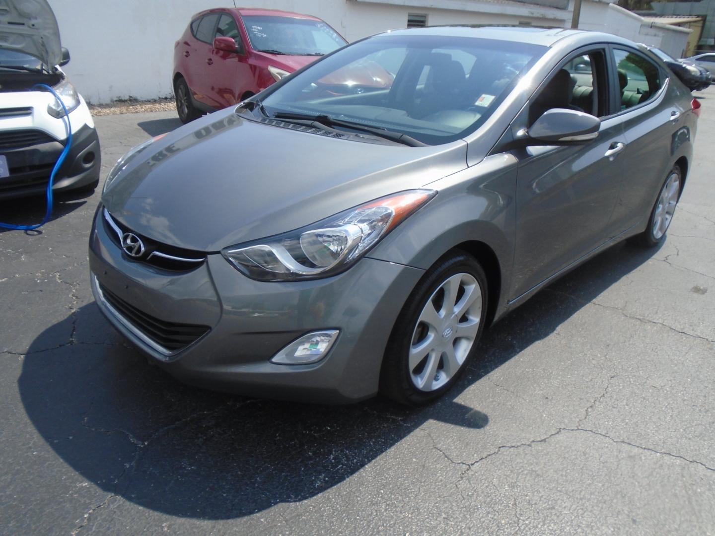 2013 Hyundai Elantra Limited (5NPDH4AE6DH) with an 1.8L L4 DOHC 16V engine, 6-Speed Automatic transmission, located at 6112 N Florida Avenue, Tampa, FL, 33604, (888) 521-5131, 27.954929, -82.459534 - Photo#3