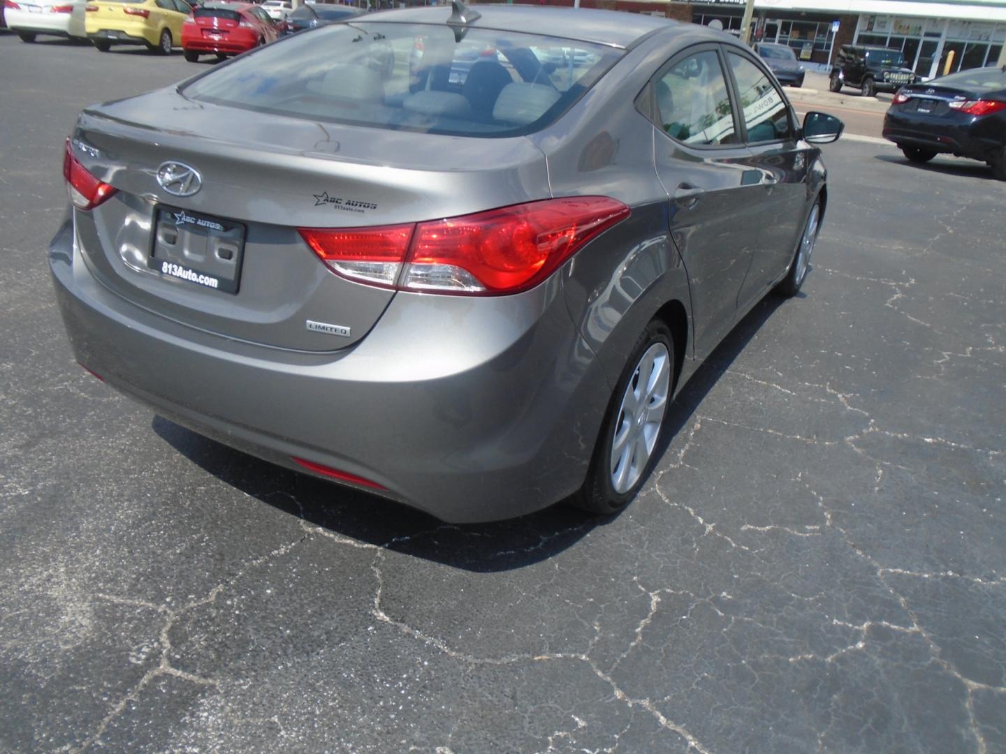 2013 Hyundai Elantra Limited (5NPDH4AE6DH) with an 1.8L L4 DOHC 16V engine, 6-Speed Automatic transmission, located at 6112 N Florida Avenue, Tampa, FL, 33604, (888) 521-5131, 27.954929, -82.459534 - Photo#5