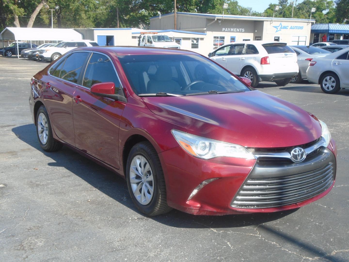 2016 Toyota Camry SE (4T1BF1FKXGU) with an 2.5L L4 DOHC 16V engine, 6-Speed Automatic transmission, located at 6112 N Florida Avenue, Tampa, FL, 33604, (888) 521-5131, 27.954929, -82.459534 - Photo#2