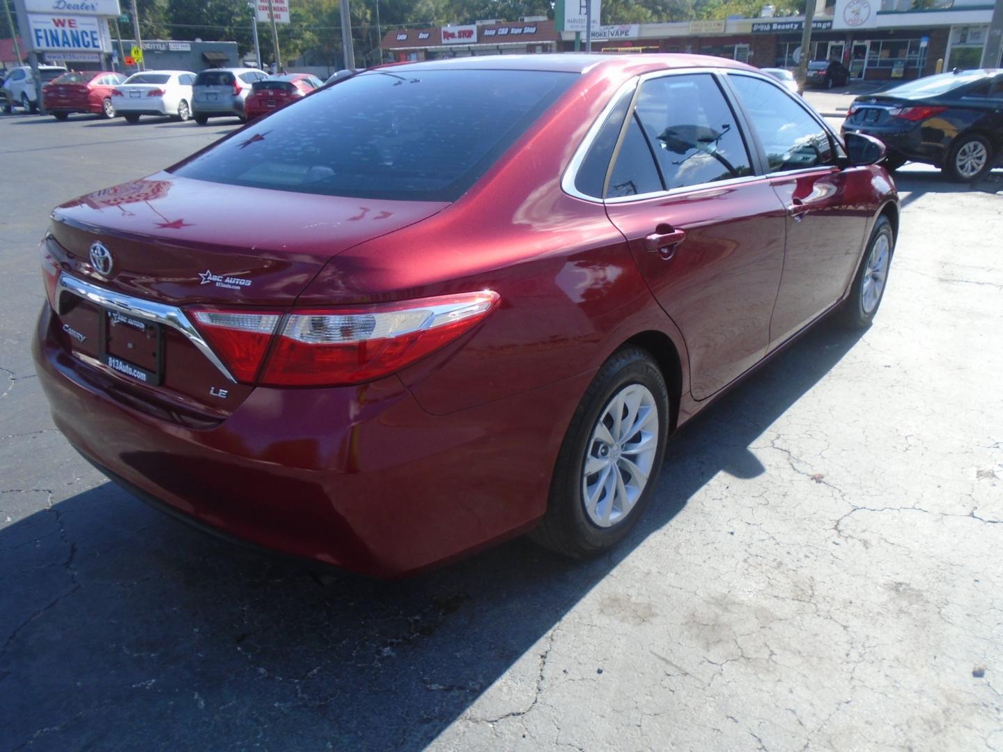 2016 Toyota Camry SE (4T1BF1FKXGU) with an 2.5L L4 DOHC 16V engine, 6-Speed Automatic transmission, located at 6112 N Florida Avenue, Tampa, FL, 33604, (888) 521-5131, 27.954929, -82.459534 - Photo#5