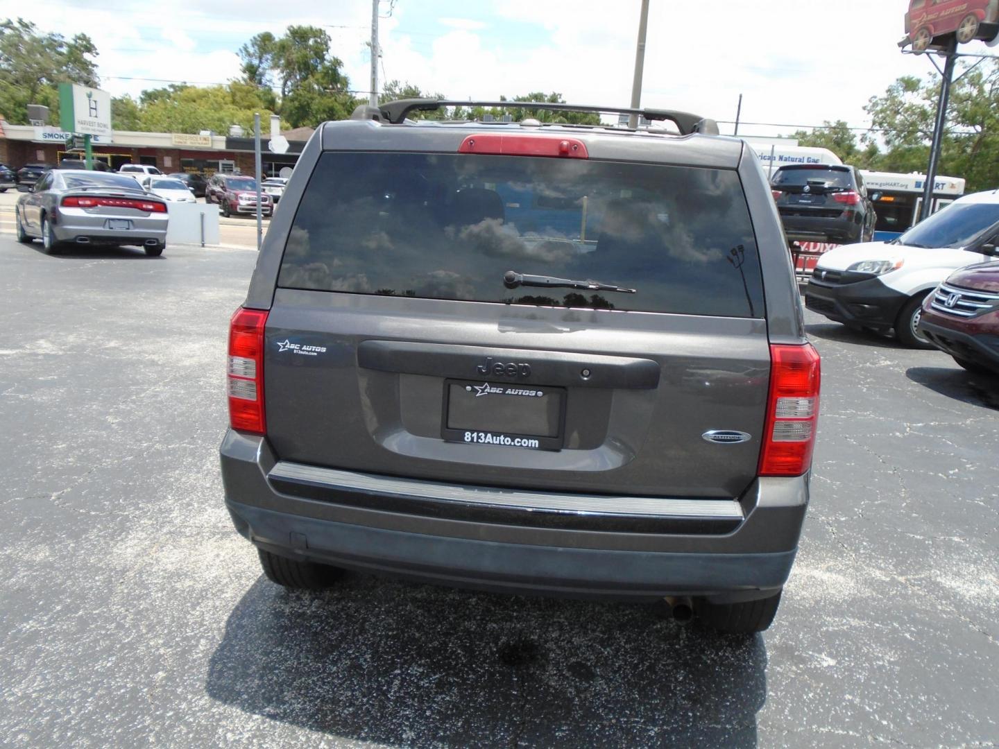 2015 Jeep Patriot Sport 2WD (1C4NJPBA5FD) with an 2.0L L4 DOHC 16V engine, located at 6112 N Florida Avenue, Tampa, FL, 33604, (888) 521-5131, 27.954929, -82.459534 - Photo#4