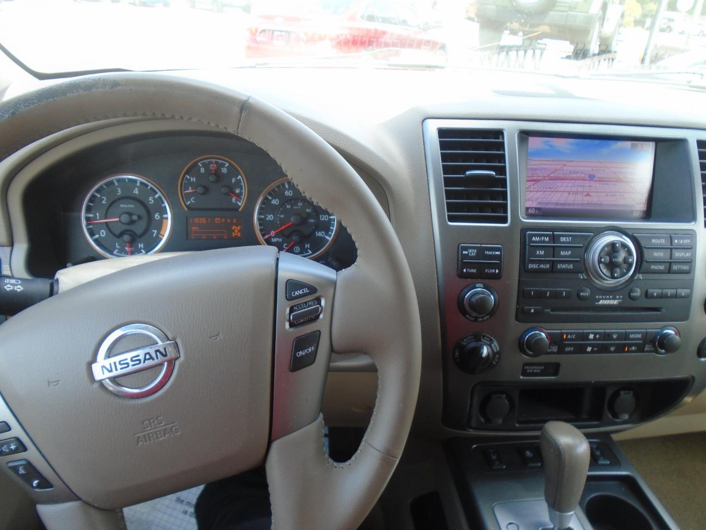 2013 Nissan Armada SL 4WD (5N1BA0NC3DN) with an 5.6L V8 DOHC 32V FFV engine, 5-Speed Automatic transmission, located at 6112 N Florida Avenue, Tampa, FL, 33604, (888) 521-5131, 27.954929, -82.459534 - Photo#13