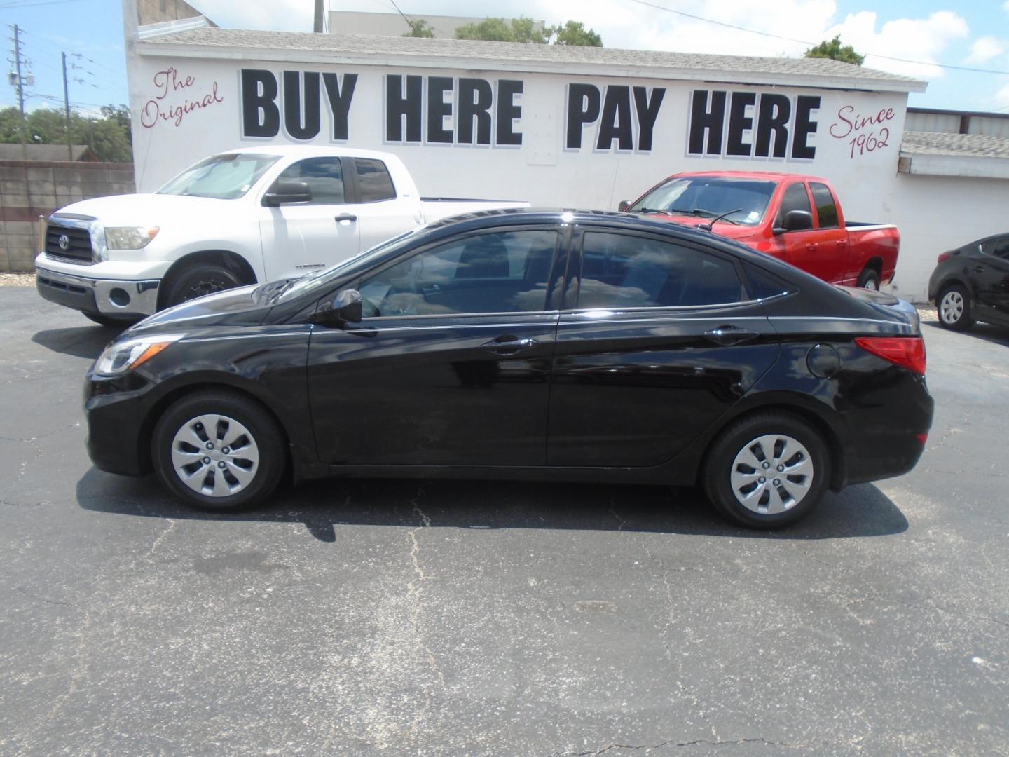 2015 Hyundai Accent GLS 4-Door 6A (KMHCT4AE9FU) with an 1.6L L4 DOHC 16V engine, 6-Speed Automatic transmission, located at 6112 N Florida Avenue, Tampa, FL, 33604, (888) 521-5131, 27.954929, -82.459534 - Photo#0