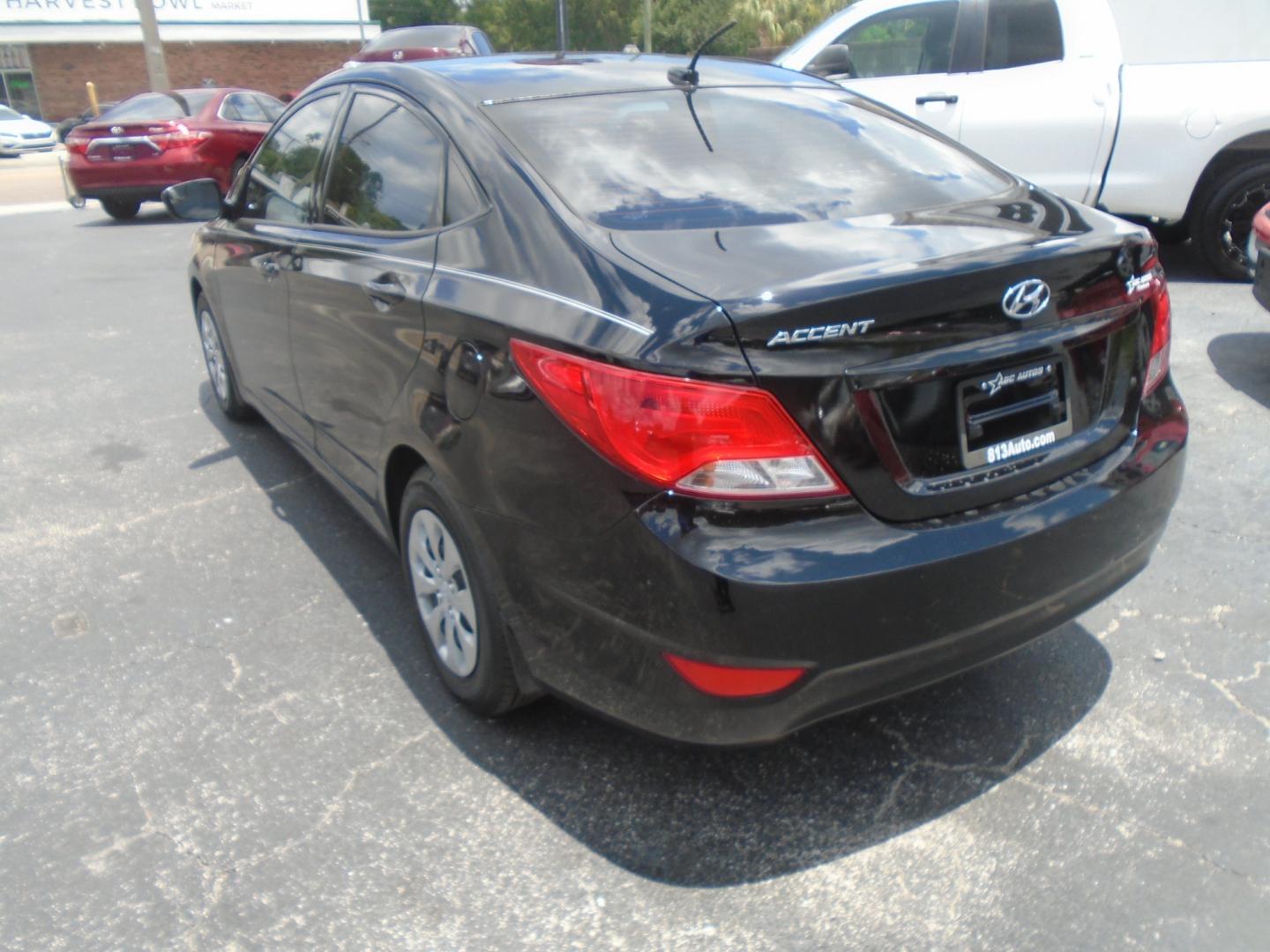 2015 Hyundai Accent GLS 4-Door 6A (KMHCT4AE9FU) with an 1.6L L4 DOHC 16V engine, 6-Speed Automatic transmission, located at 6112 N Florida Avenue, Tampa, FL, 33604, (888) 521-5131, 27.954929, -82.459534 - Photo#4