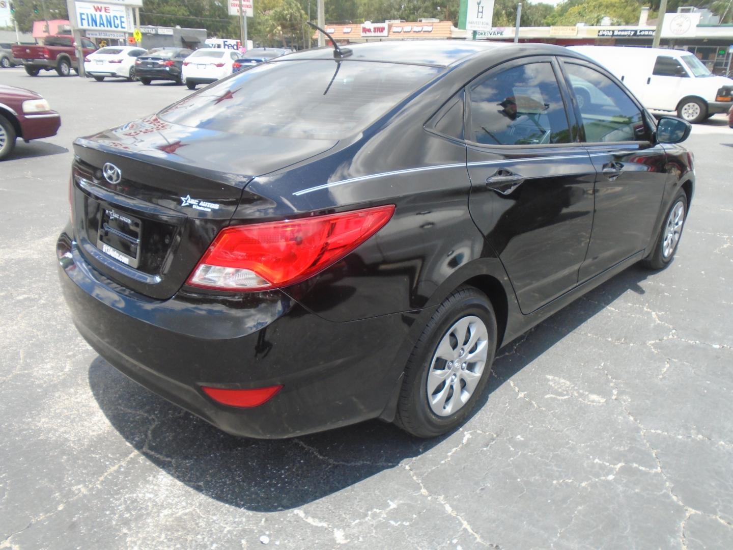 2015 Hyundai Accent GLS 4-Door 6A (KMHCT4AE9FU) with an 1.6L L4 DOHC 16V engine, 6-Speed Automatic transmission, located at 6112 N Florida Avenue, Tampa, FL, 33604, (888) 521-5131, 27.954929, -82.459534 - Photo#5